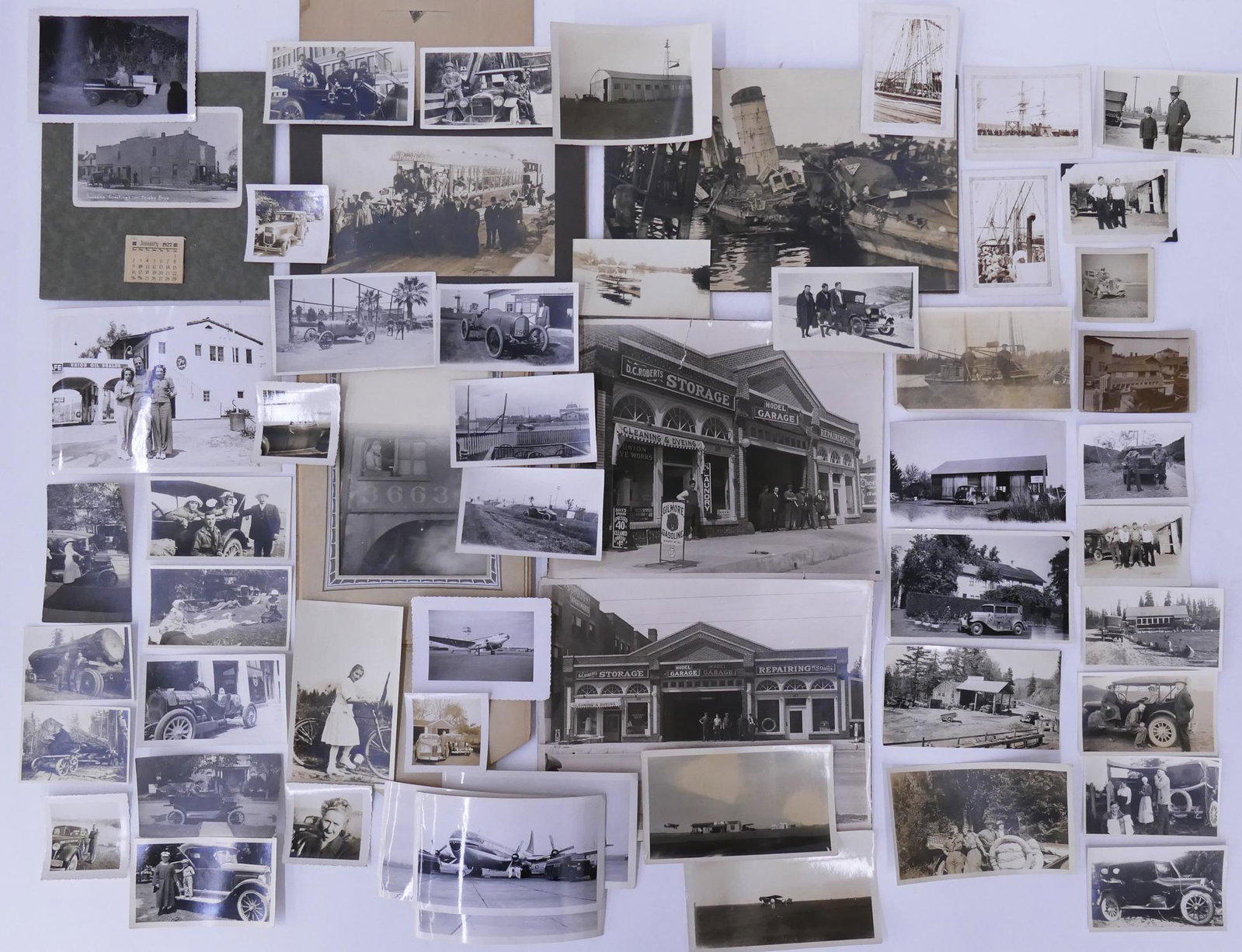 Snapshot Photographs of Cars, Planes, and Boats: Collection of Snapshot Photographs of Cars, Planes, and Boats. Includes 56 photographs of early 20th century automobile racing, images of automotive garages, biplanes and midcentury passenger planes. 