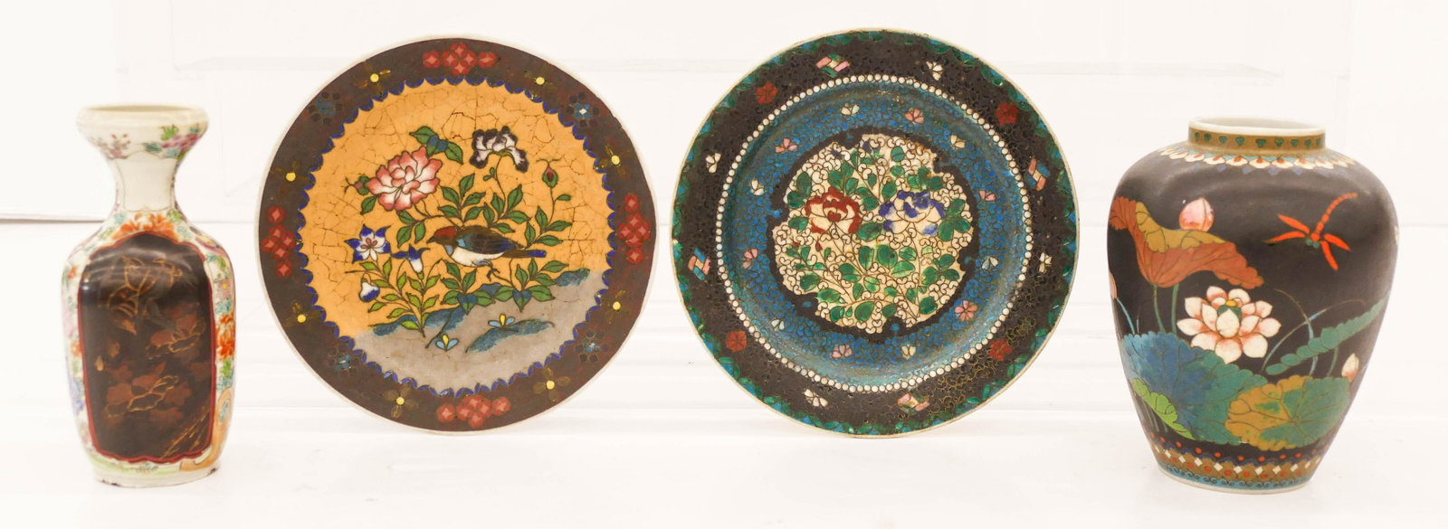 4pc Japanese Meiji Totai Shippo Porcelain 6'' to 7'': 4pc Japanese Meiji Totai Shippo Porcelain 6'' to 7'' Long. Includes a cloisonne over porcelain black ground lotus vase, a bird and flower plate, a satsuma floral plate (cracked), and a lacquered panel