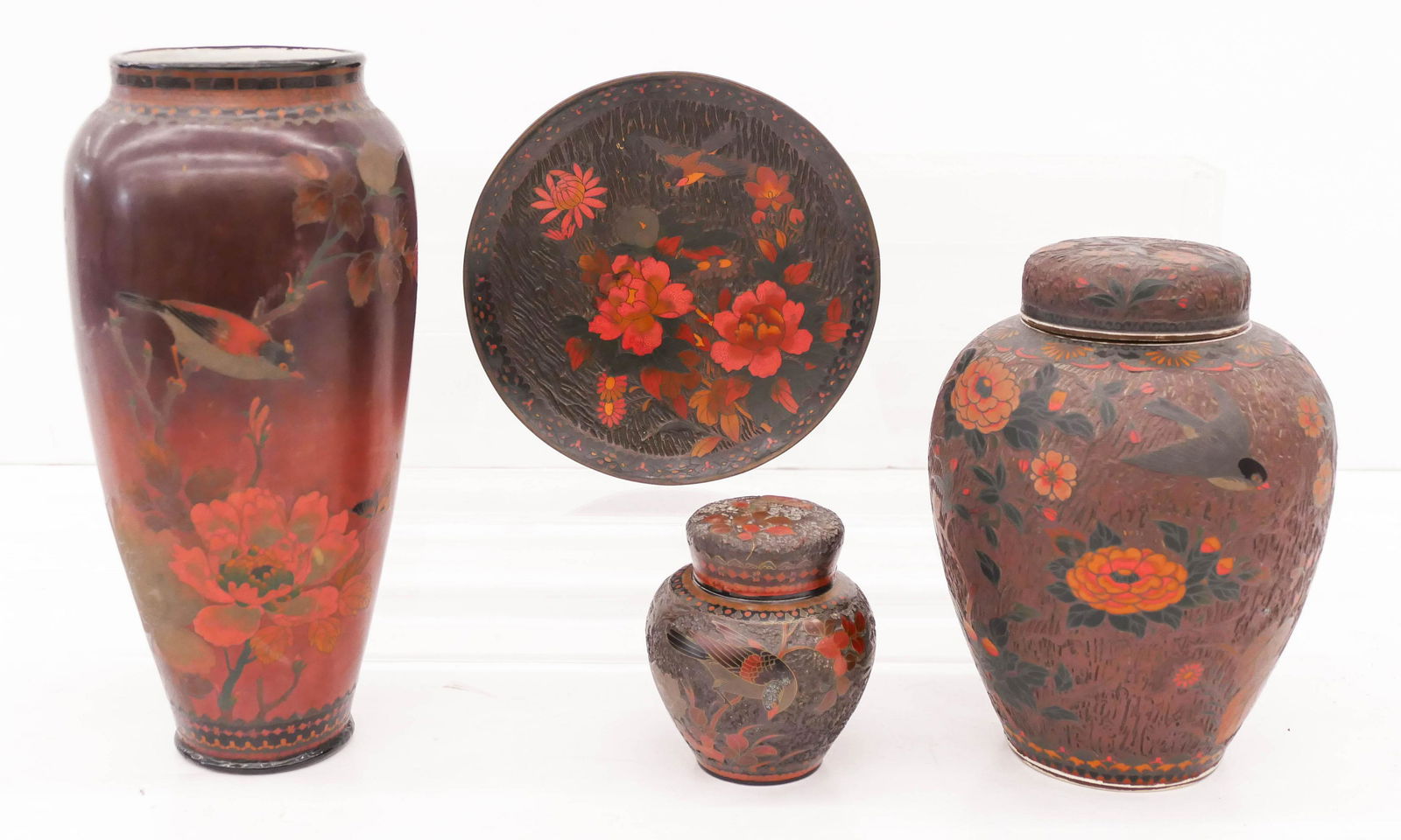 4pc Japanese Meiji Tree Bark Cloisonne Objects: 4pc Japanese Meiji Tree Bark Cloisonne Objects 4.5'' to 12'' Tall. Includes a totai shippo porcelain tall bird vase, a large porcelain covered jar, a smaller ginger jar, and a cloisonne plate. Unmarke