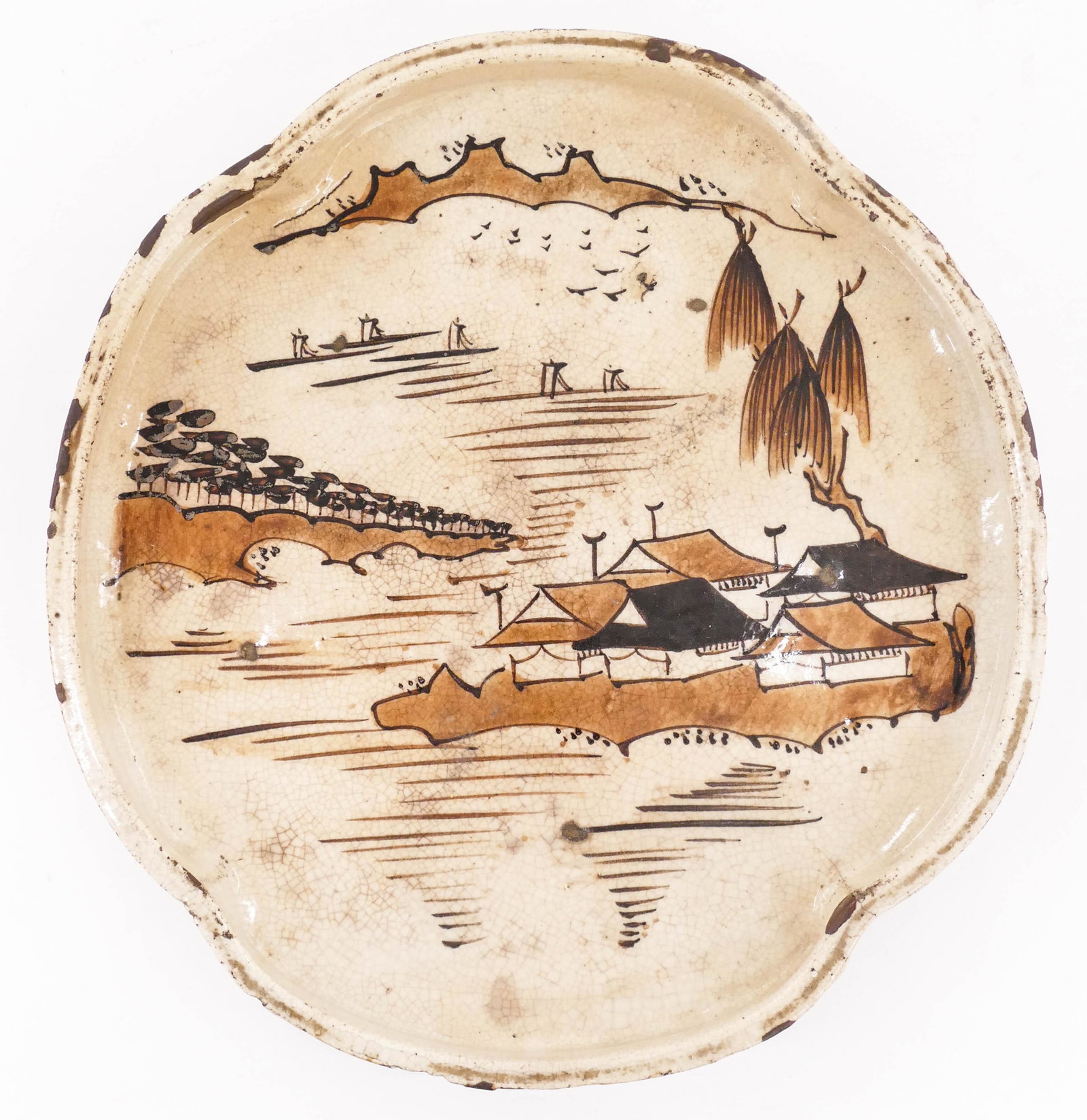 Japanese Edo Seto Ware Oval Tray 1.25''x9.5''x9'': Japanese Edo Seto Ware Oval Tray 1.25''x9.5''x9''. Early ceramic tray with brown temple landscape motif. Museum inventory numbering on bottom. Scattered old chip repairing to edge with one hairline. 1
