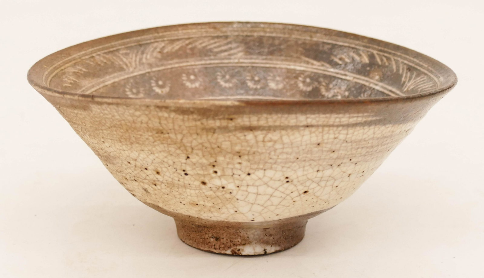 Japanese Muromachi Mishima Ware Tea Bowl 2.5''x5.75": Japanese Muromachi Mishima Ware Tea Bowl 2.5''x5.75''. A term used for Korean buncheong ceramics by the Japanese. Impressed white slip decoration. It has two small kintsugi old rim chip repairs. Overa