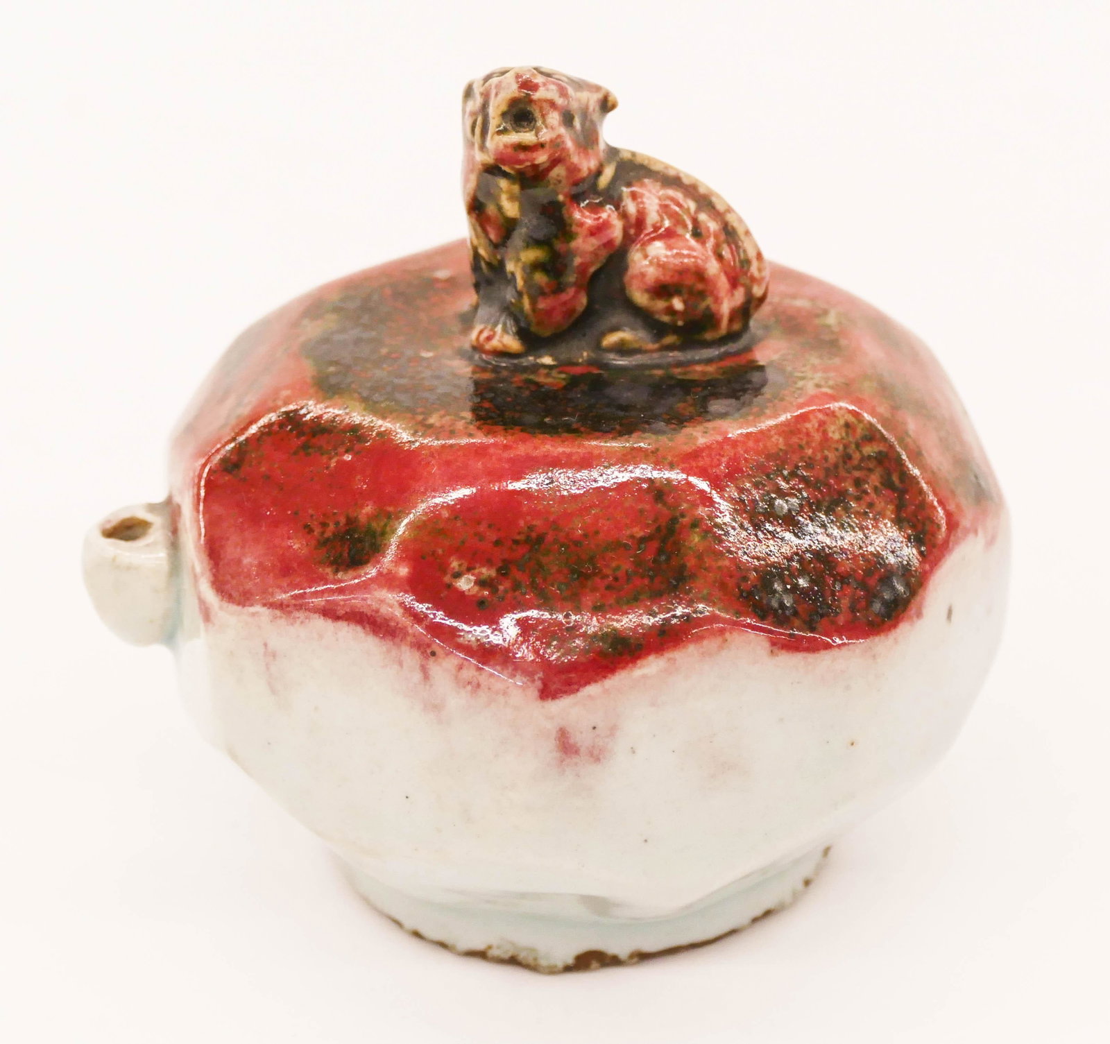 Korean Joseon Copper Red Large Water Dropper 4''x4'': Korean Joseon Copper Red Large Water Dropper 4''x4''. A copper red decorated white porcelain water dropper with figural hae-tae finial. Excellent condition. 18th or 19th century. Collection of W. Gord