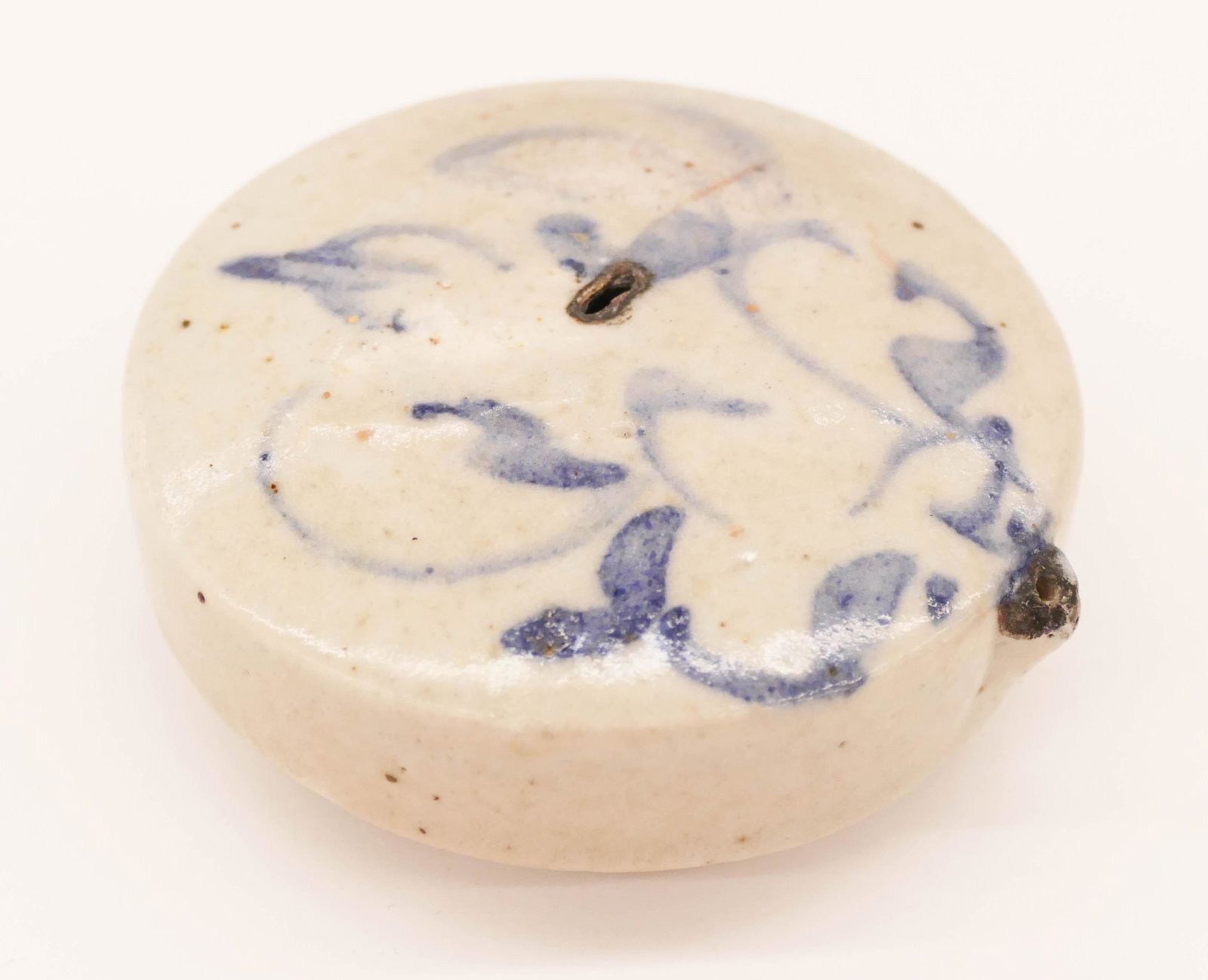 Korean Joseon Blue and White Round Water Dropper: Korean Joseon Blue and White Round Water Dropper 1.25''x3''. Blue underglaze decorated ceramic with scrolling motif. Slight chip to spout. 18th or 19th century. Collection of W. Gordon Menzies, Seattl