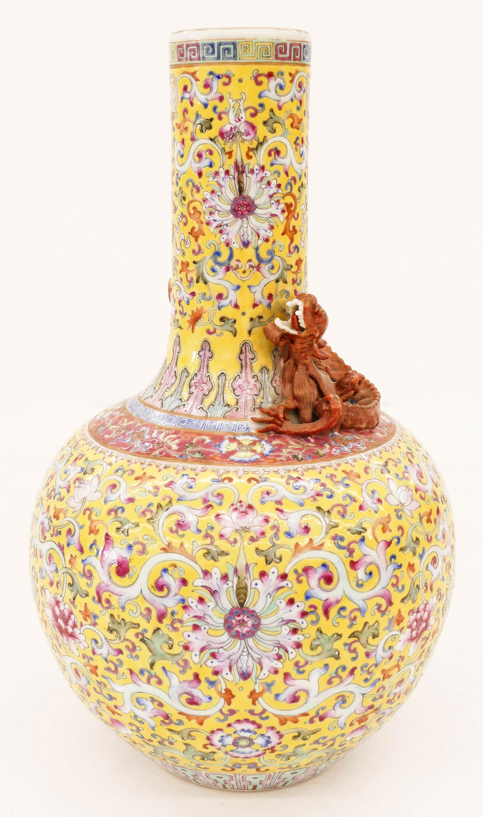 Fine Chinese Republic Famille Rose Dragon Bottle Vase: Fine Chinese Republic Famille Rose Dragon Bottle Vase 13.25''x7.75''. Yellow ground Imperial-style porcelain vase with applied gilt copper red four-clawed dragon around neck. Polychrome scrolling lotu