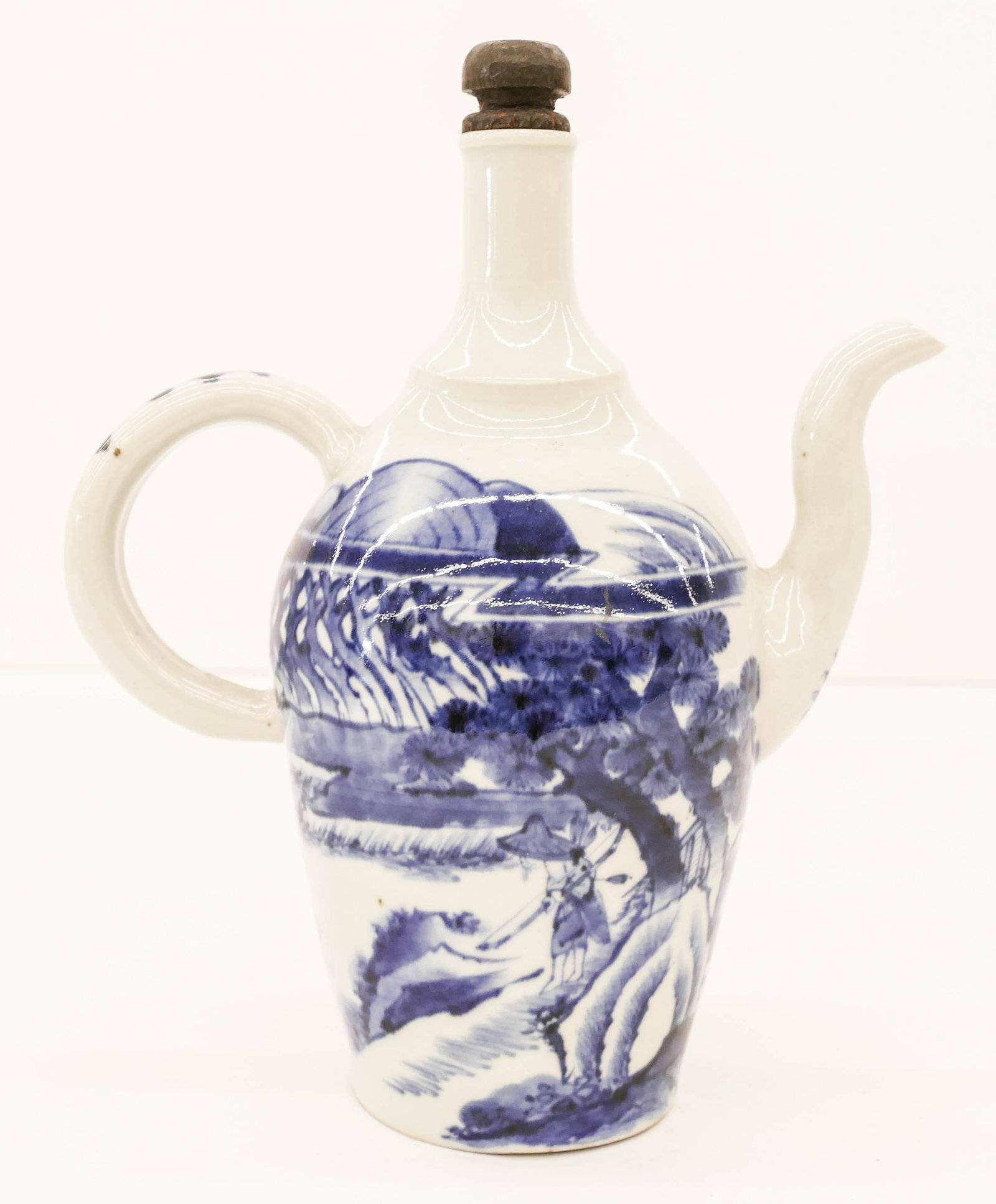 Chinese Qing Export Blue and White Wine Jug 11''x9'': Chinese Qing Export Blue and White Wine Jug 11''x9''. Unusual porcelain export ewer with calligraphy and deer in landscape motif. Possibly Blue de Hue for the Vietnamese market. One tiny flea bite to 