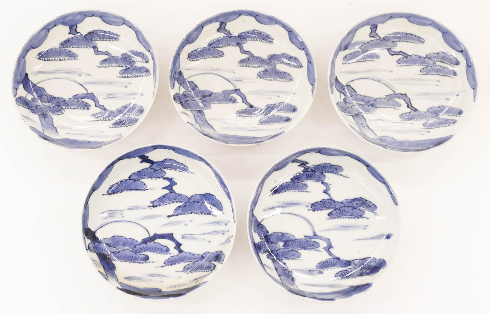 5pc Japanese 18th Cent. Sometsuke Pine Tree Low Bowls: 5pc Japanese 18th Cent. Sometsuke Pine Tree Low Bowls 5.75''x1.25''. Group of five blue and white porcelain bowls. Excellent condition. Edo period. Collection of W. Gordon Menzies, Seattle.