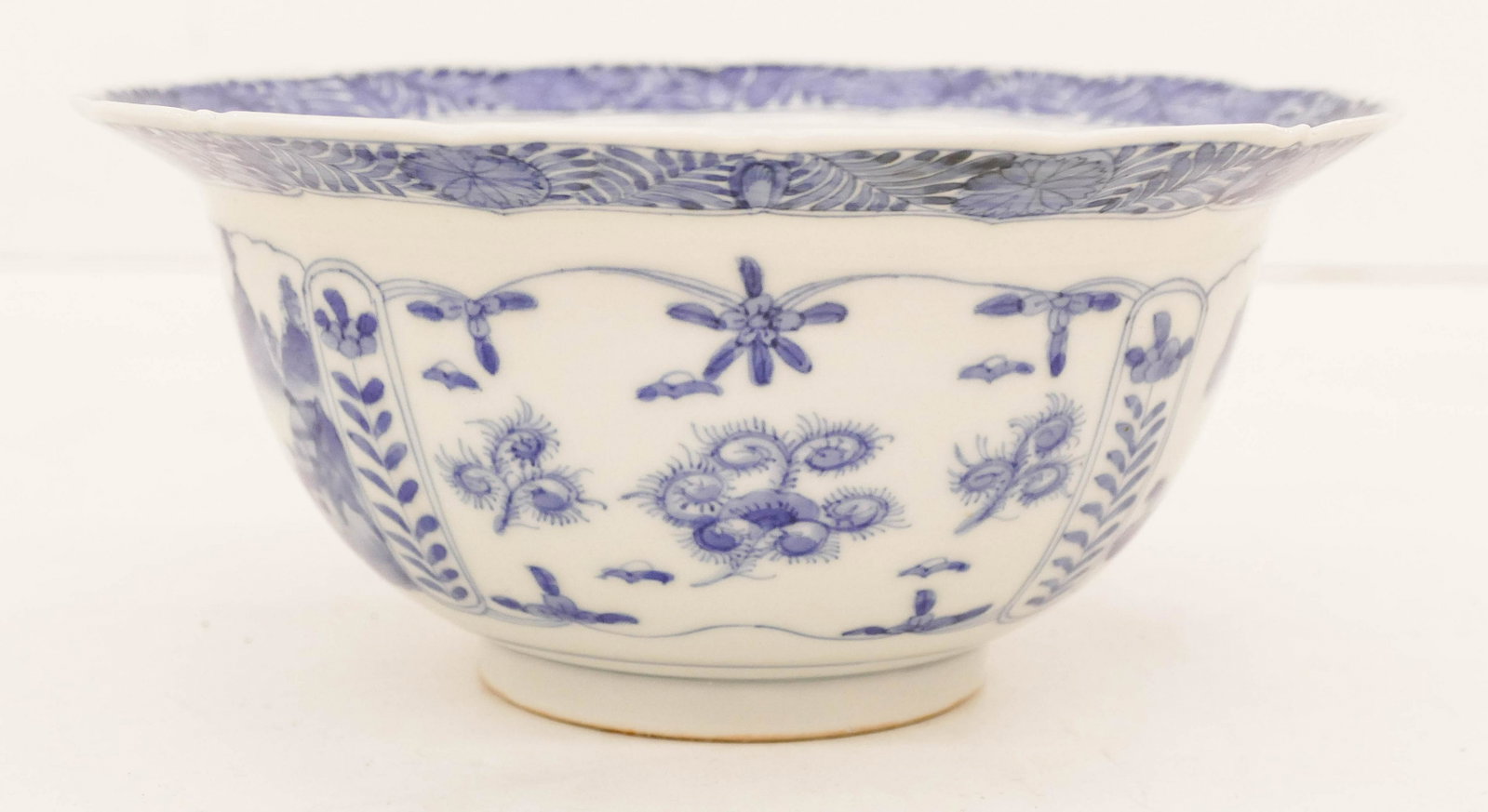 Japanese Meiji Hirado Foliate Rim Bowl: Japanese Meiji Hirado Foliate Rim Bowl 3.5''x8''. A fine porcelain blue and white bowl with landscape motifs. Six character mark. Excellent condition. Early 20th century. Collection of W. Gordon Menzi