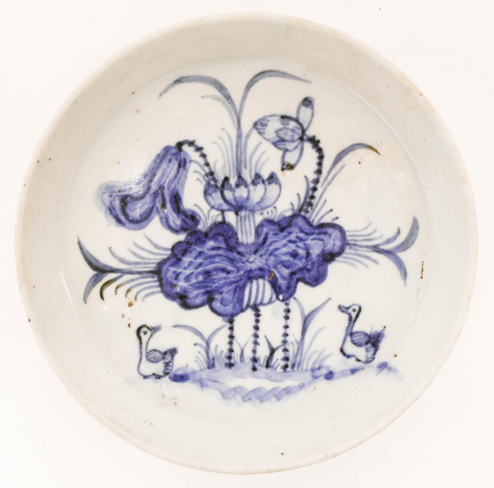 Vietnamese 18th Cent. Blue de Hue Lotus Tray 5.75'': Vietnamese 18th Cent. Blue de Hue Lotus Tray 5.75''x1.25''. A blue and white heavy ceramic tray with louts and duck motif. Excellent condition. Later Le dynasty. Collection of W. Gordon Menzies, Seatt