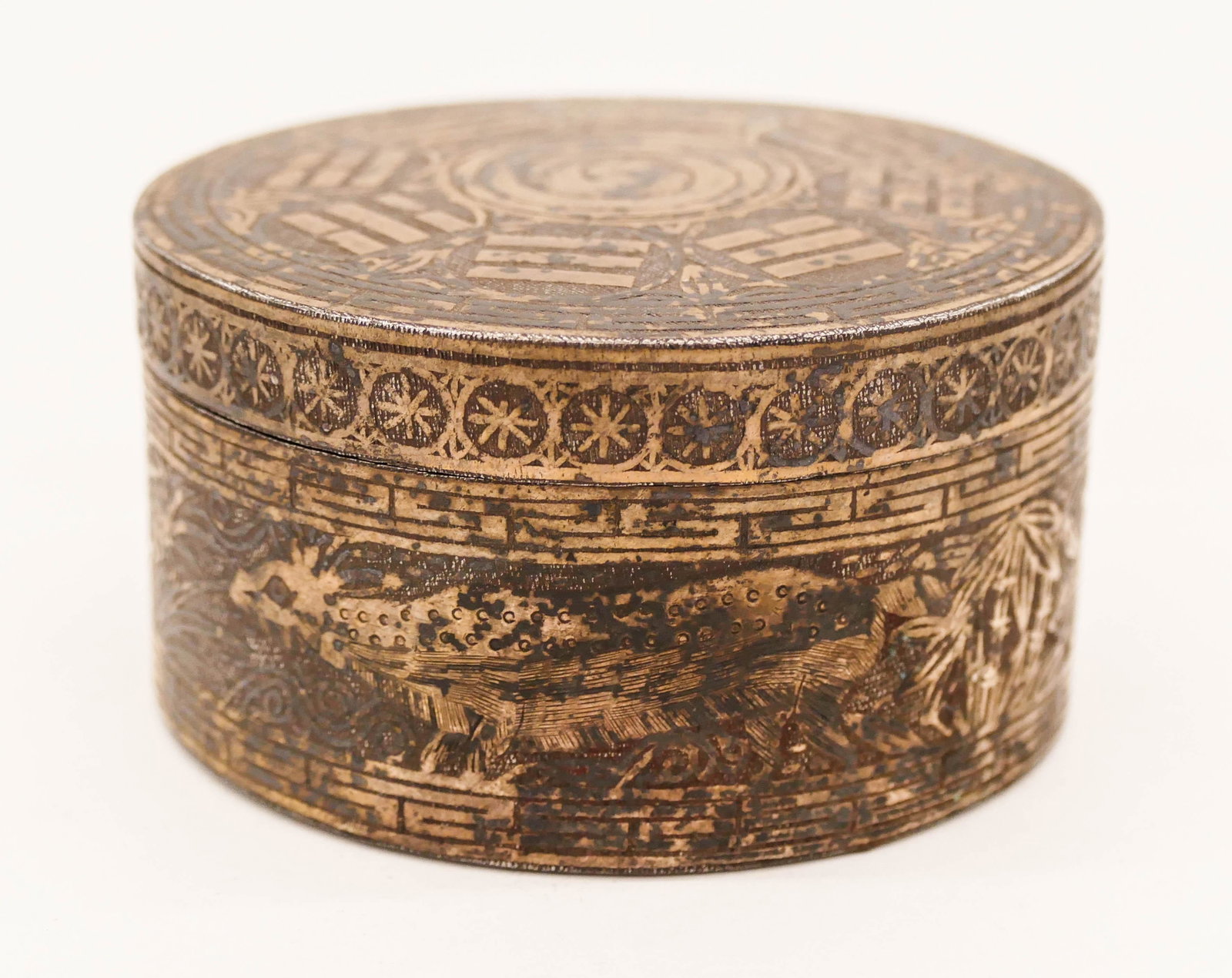 Korean Joseon Round Silver Inlaid Iron Box: Korean Joseon Round Silver Inlaid Iron Box 1.5''x2.75''. A fine silver inlaid box with the buddhist trigrams on cover. Some scattered surface wear. 18th or 19th century. Collection of W. Gordon Menzie