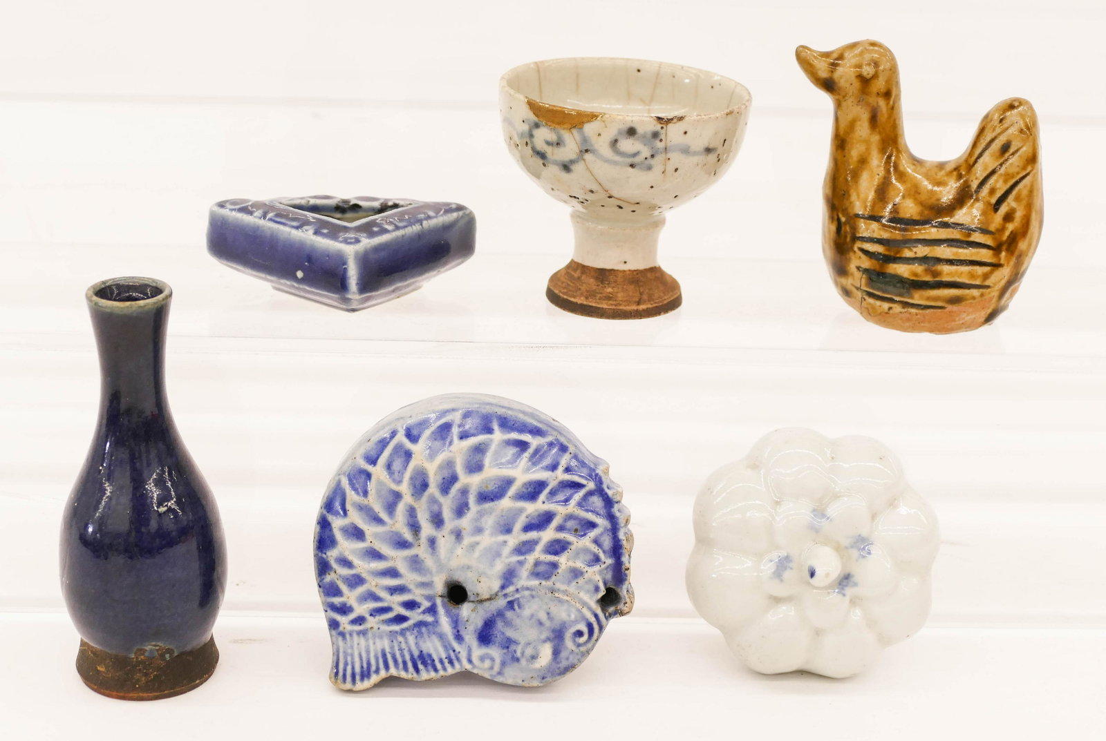 6pc Antique Asian Small Ceramics 2.5'' to 4'' Long: 6pc Antique Asian Small Ceramics 2.5'' to 4'' Long. Includes a korean water dropper, a Chinese porcelain scroll weight, japanese arita stem cup, Chinese triangle water coupe, a blue monochrome vase, a