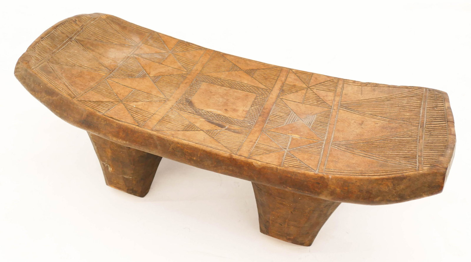 Antique Nupe African Carved Bench 6''x17''x6.5'': Antique Nupe African Carved Bench 6''x17''x6.5''. A Nigerian carved hardwood four-legged stool or headrest with geometric motif. Some edge chipping and surface wear from use. 19th or early 20th centur