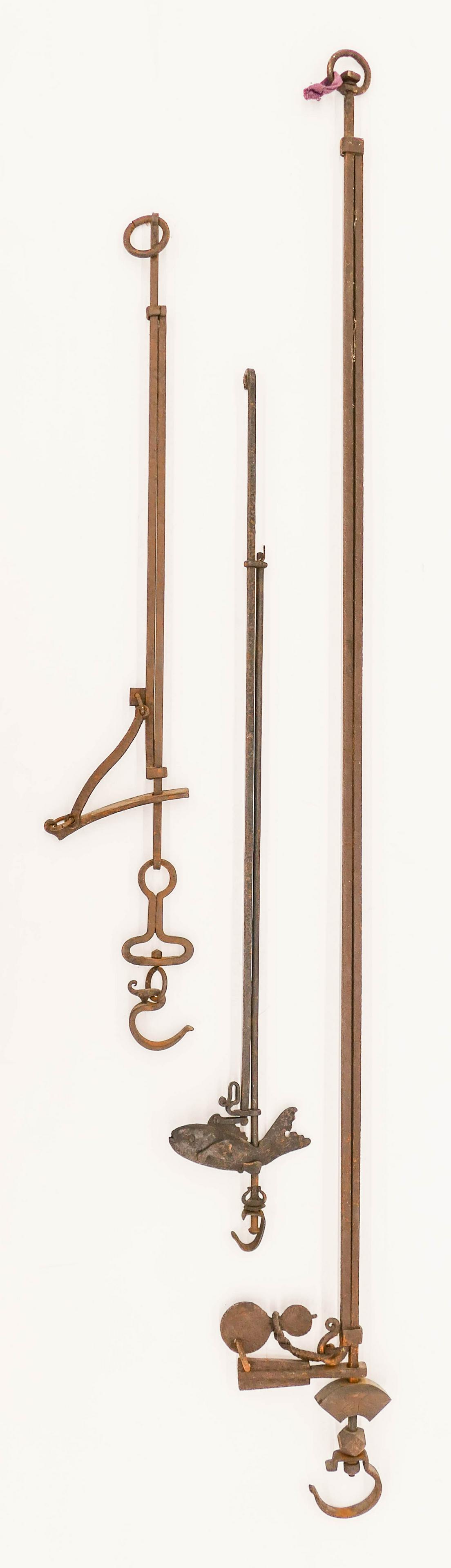 3pc Old Japanese Iron Kettle Hooks 38'' to 62'' Long: 3pc Old Japanese Iron Kettle Hooks 38'' to 62'' Long. A trio of iron adjustable hooks, one with a figural fish ornament. Scattered surface wear from age. 18th or 19th century, Edo to Meiji era. Collec