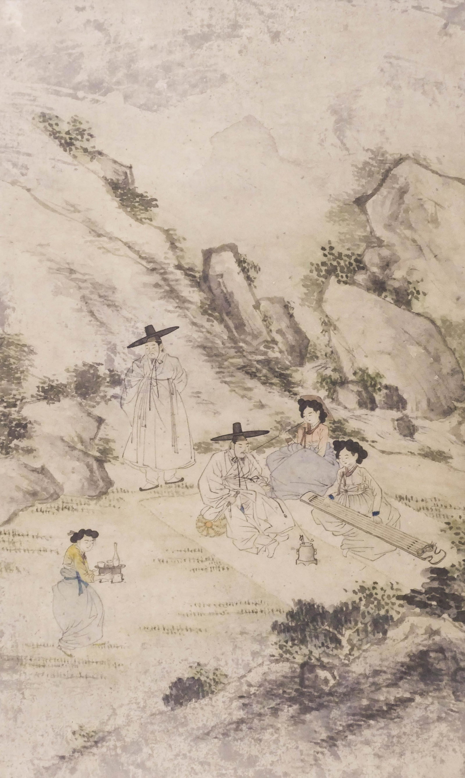 Korean Joseon Picnic Scene Watercolor Painting: Korean Joseon Picnic Scene Watercolor Painting 21.5''x13.25'' Image. An ink and watercolor on paper painting of figures picnicking and playing instruments in landscape. Unsigned. Framed size 27''x19''