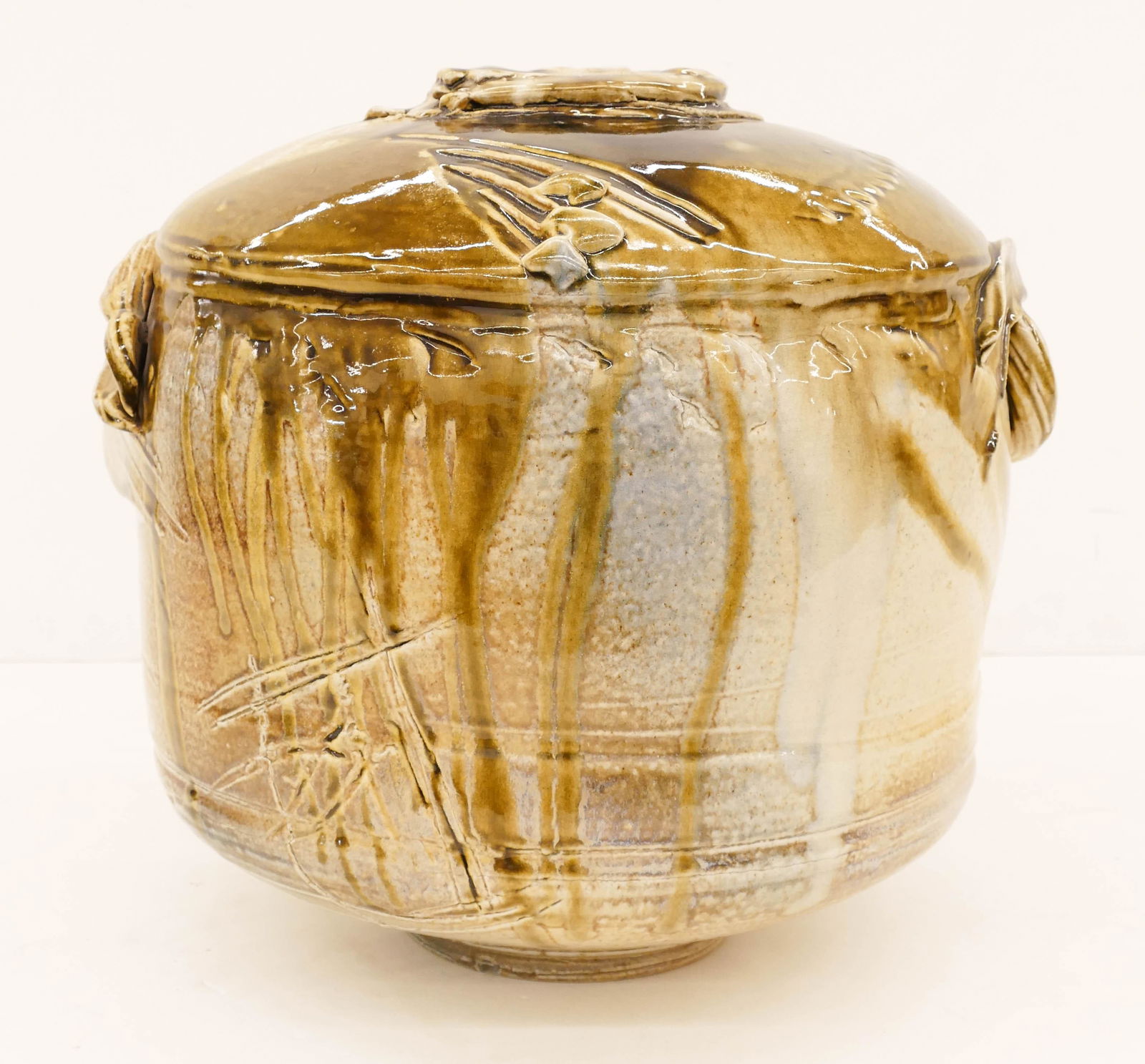 Don Reitz Large Salt Fired Jar: Don Reitz (1929-2014 Arizona) Large Salt Fired Jar Glazed Stoneware 17''x18''. Impressive large wheel thrown and altered form handled jar with splash glazes. Incised signature on bottom. Excellent con