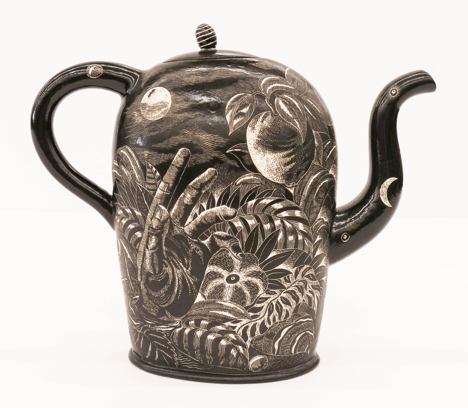 Kurt Weiser ''Night Garden'' Teapot 1990: Kurt Weiser (b.1950 American) ''Night Garden'' Teapot 1990 Ceramic 11''x13''. Impressive sgraffito decorated porcelain depicting a surrealist hand and snake within foliage. Signed on side and dated un