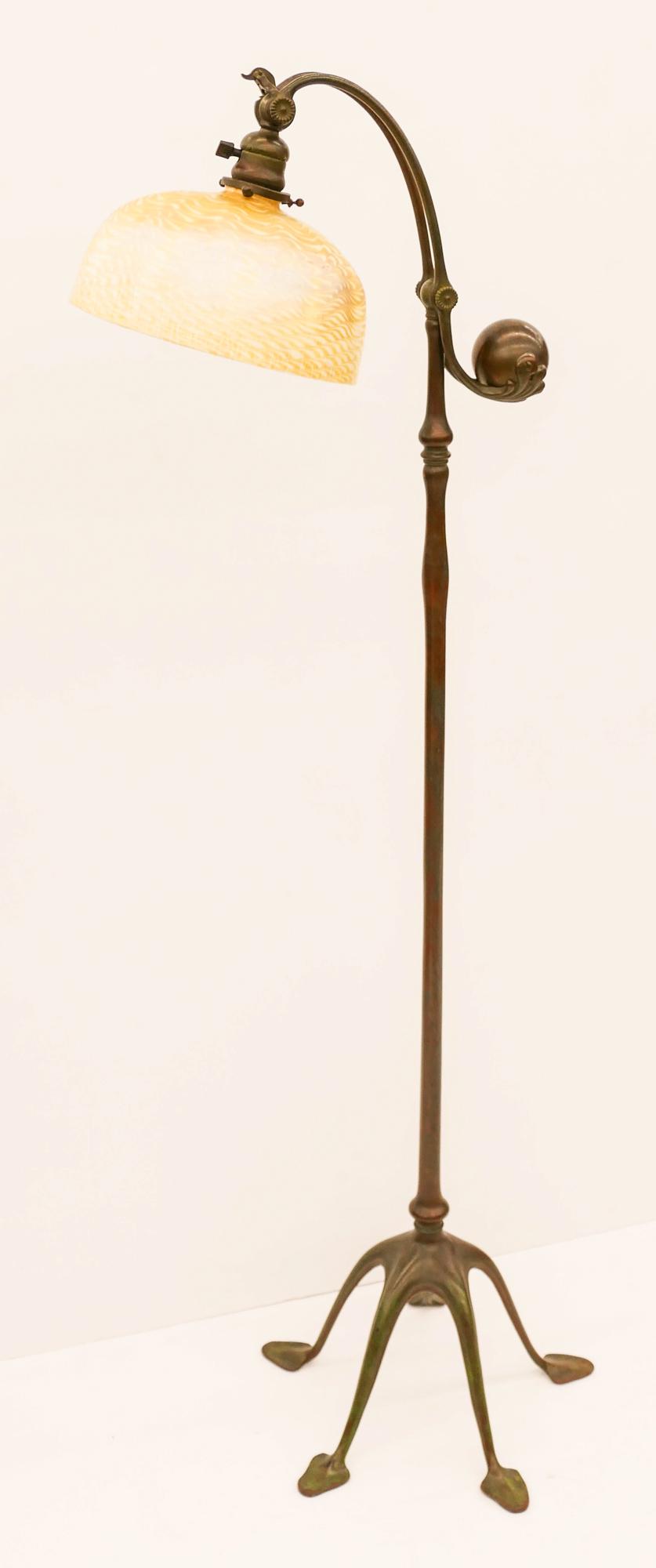 Tiffany Studios #468 Bronze Counterbalance Floor Lamp: Tiffany Studios #468 Bronze Counterbalance Floor Lamp 56''x15''. Original bronze ball counterweight floor lamp with a marked L.C. Tiffany Favrile gold damascene shade 10.25''. Base is stamped on botto