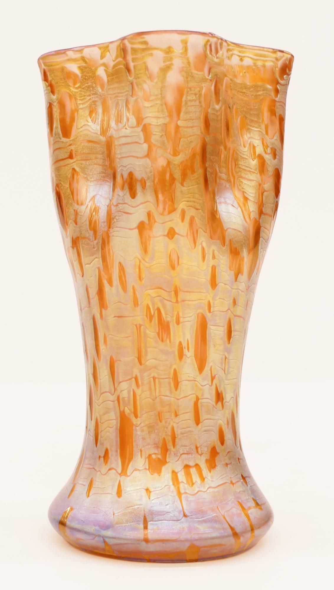 Loetz Gold Orbulin Iridescent Glass Vase: Loetz Gold Orbulin Iridescent Glass Vase 9''x4.75''. Unusual ruffled edge diaspora square bohemian vase. Unmarked. Excellent condition.