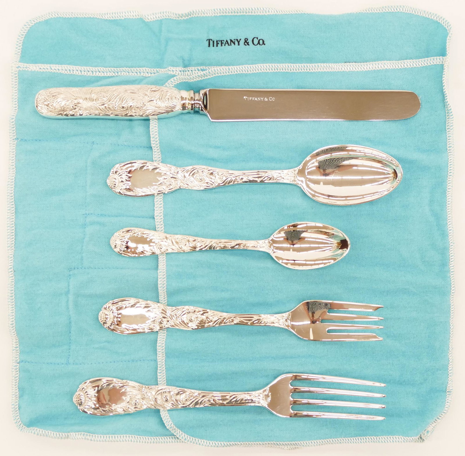40pc Tiffany & Co. ''Chrysanthemum'' Sterling Flatware: 40pc Tiffany & Co. ''Chrysanthemum'' Sterling Flatware Service for 8. A complete five-piece service for eight including a dinner fork 7.5'', salad fork 7'', tea spoon 5.5'', table spoon 7'', and dinne