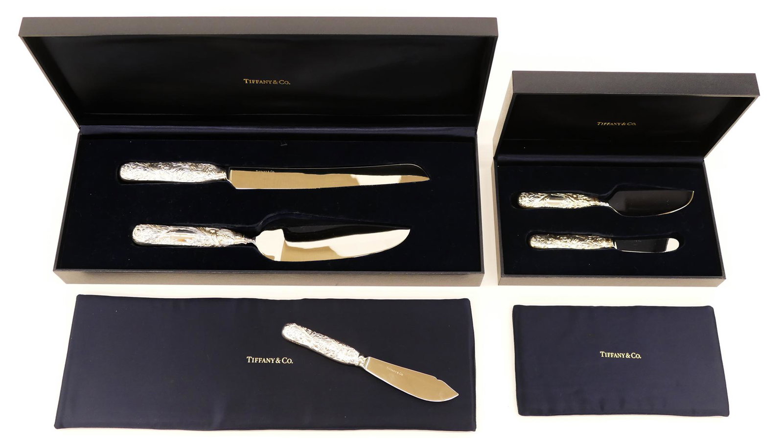 5pc Tiffany & Co. ''Chrysanthemum'' Sterling Cake and: 5pc Tiffany & Co. ''Chrysanthemum'' Sterling Cake and Cheese Sets. Includes a two-pieces cake serving set 11'' and 12.5'', a two-piece cheese serving set 6'' and 7'', and a butter serving knife 7''. L