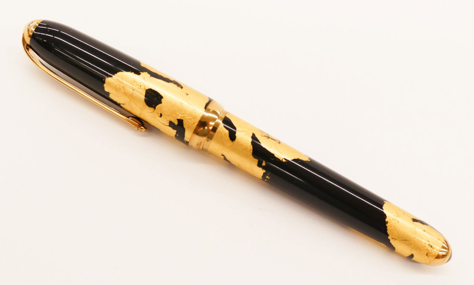 Cartier Serie Limited Dandy Gold Foil Ballpoint Pen: Cartier Serie Limited Dandy Gold Foil Ballpoint Pen 5.5''. Louis Cartier gold foil and black lacquered pen. Limited edition numbered 544 of 1847 edition. Like new condition with original leather box.