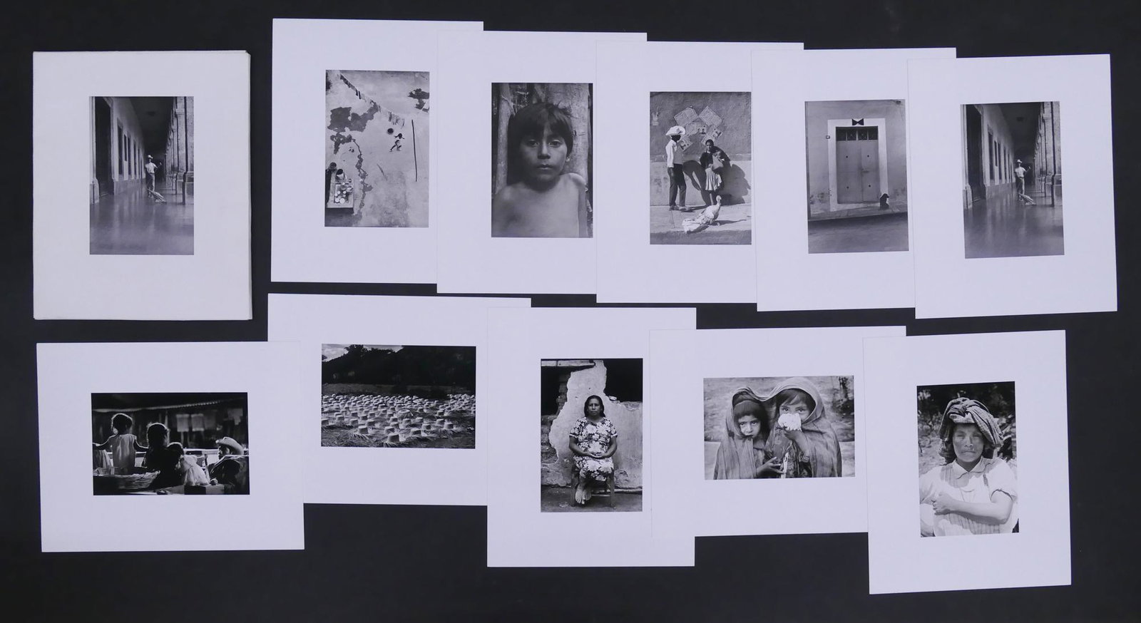 Priscilla Carrasco Photographs of Mexico Portfolio: Priscilla Carrasco (b. 1933, Oregon) 'Photographs of Mexico' Portfolio. Portfolio includes 10 photo lithograph prints mounted to cardstock. Titles on verso. Images taken between 1968-1976. Images meas