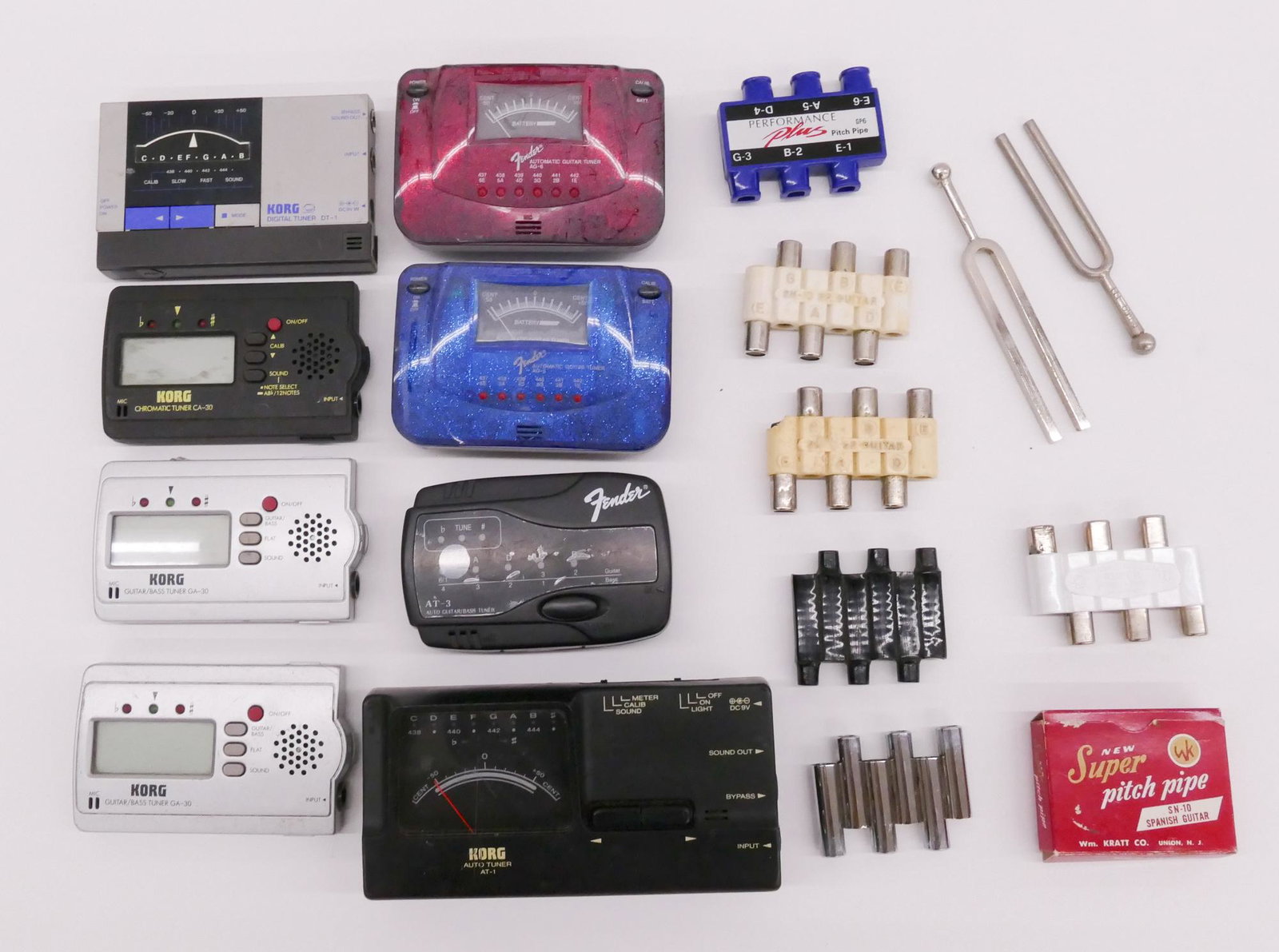 Group Tuners, Pitch Pipes, and Tuning Forks: Group Tuners, Pitch Pipes, and Tuning Forks. Includes Korg AT-1, Korg DT-1, 3pc Korg GA-30, Fender AT-3, 2pc Fender AG-6, 2pc tuning forks, and 6pc Pitch Pipes (various makers).