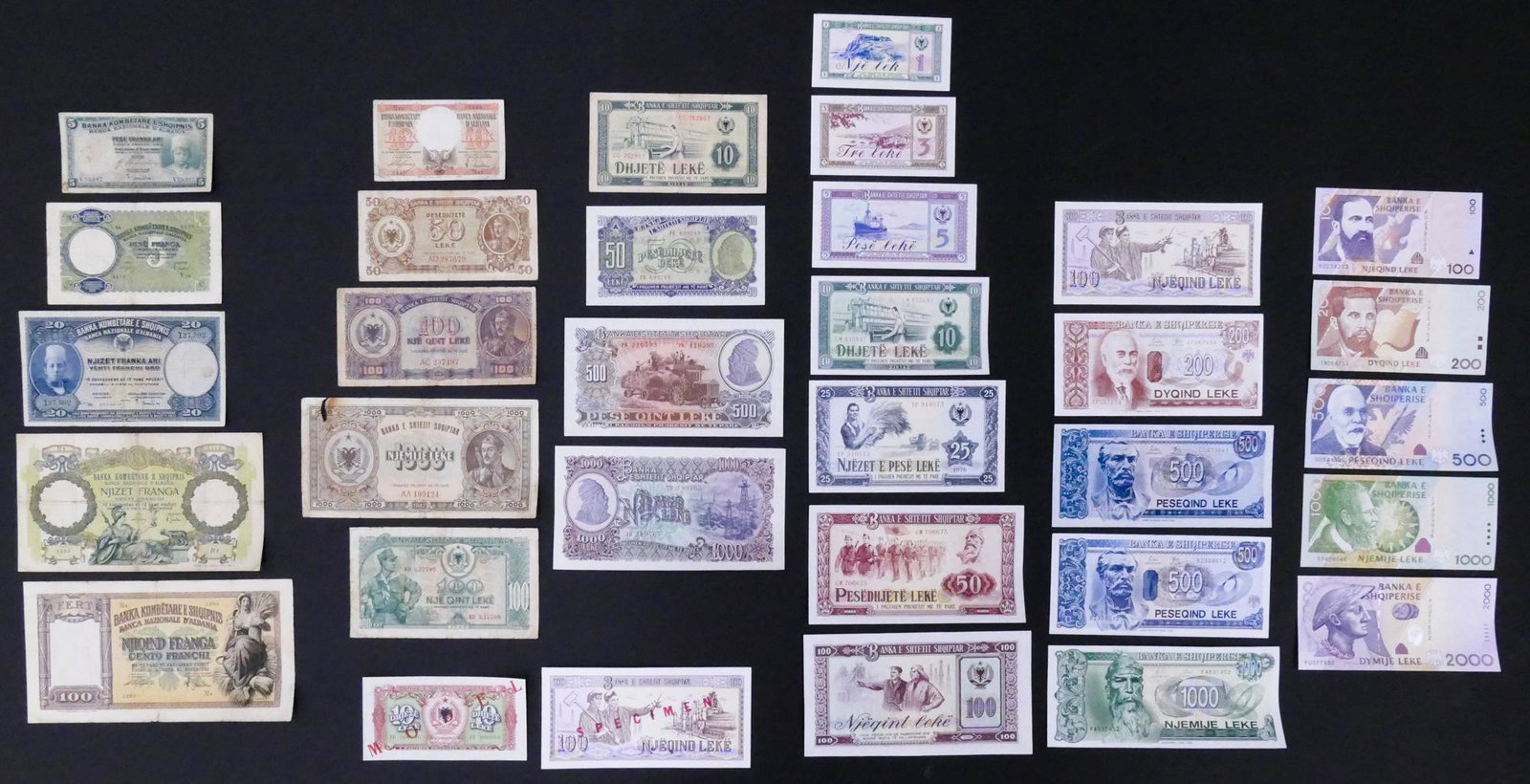 Albania- 33pc w/ 2pc Specimen. 1925-2007: Albania- 33pc w/ 2pc Specimen. 1925-2007. Early notes circulated. Specimens- Pick 28s 1957 10 Leke and Pick 47s 1991 100 Leke. Includes Banca Nazionale D'Albania Franka Ari, Franka, Franga, and People