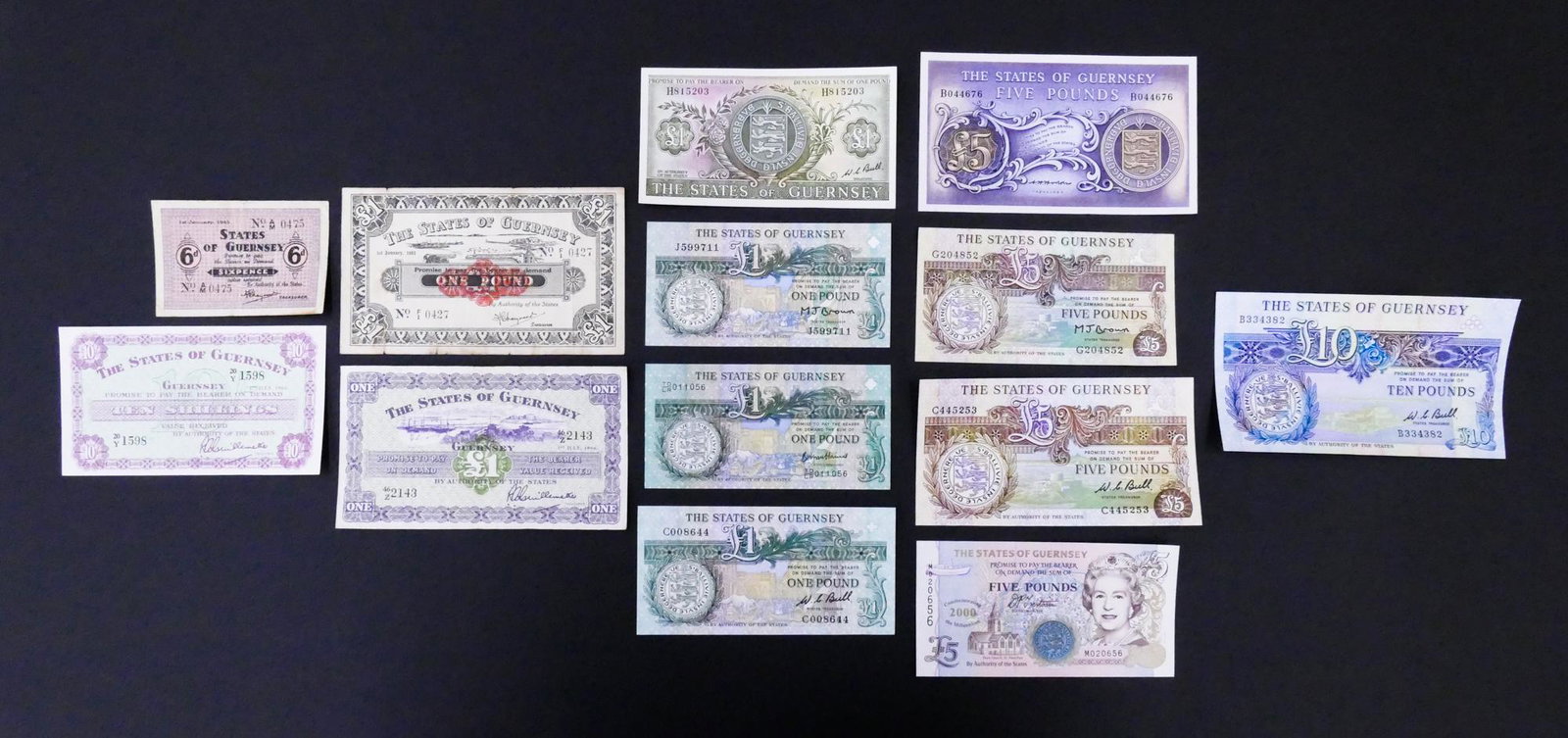 Guernsey. 13pc 1943-2000: Guernsey. 13pc 1943-2000. Includes States of Guernsey German Occupation 1 Pound 1.1.1943 Pick 33, States of Guernsey 6 Pence 1.1.1943 Pick 28, 1 Pound 1.7.1966 Pick 43c, 10 Shillings 1.7.1966 Pick 42c