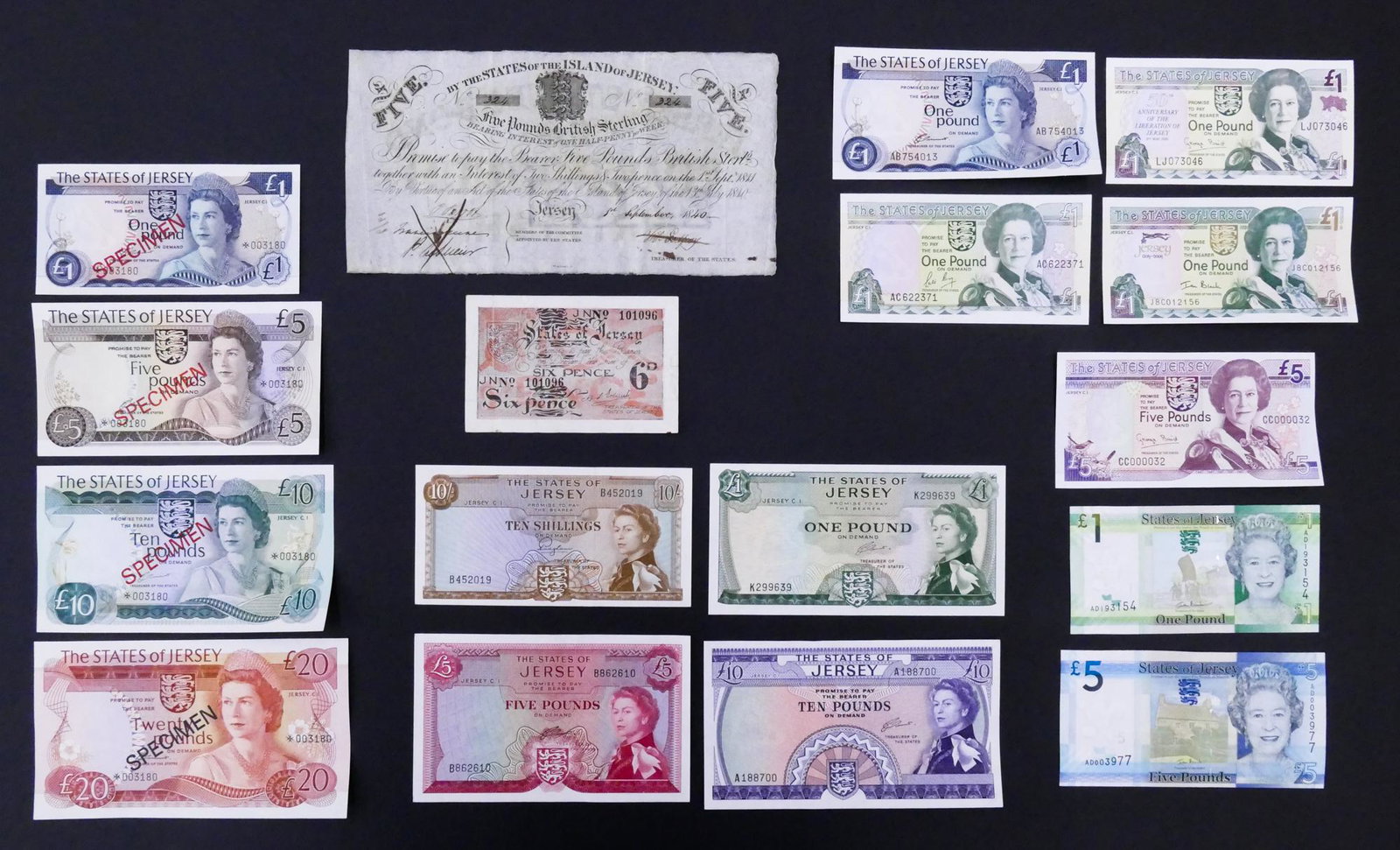 States of Jersey. 17pc 1840-2010 w/ Specimens: States of Jersey. 17pc 1840-2010. Includes 4pc 1976 Specimens Pick 11-14, States of the Island of Jersey Treasury 1840 5 Pound Pick A1b, German Occupation ND(1941) 6 Pence Pick 1, and 11pc UNC notes 1