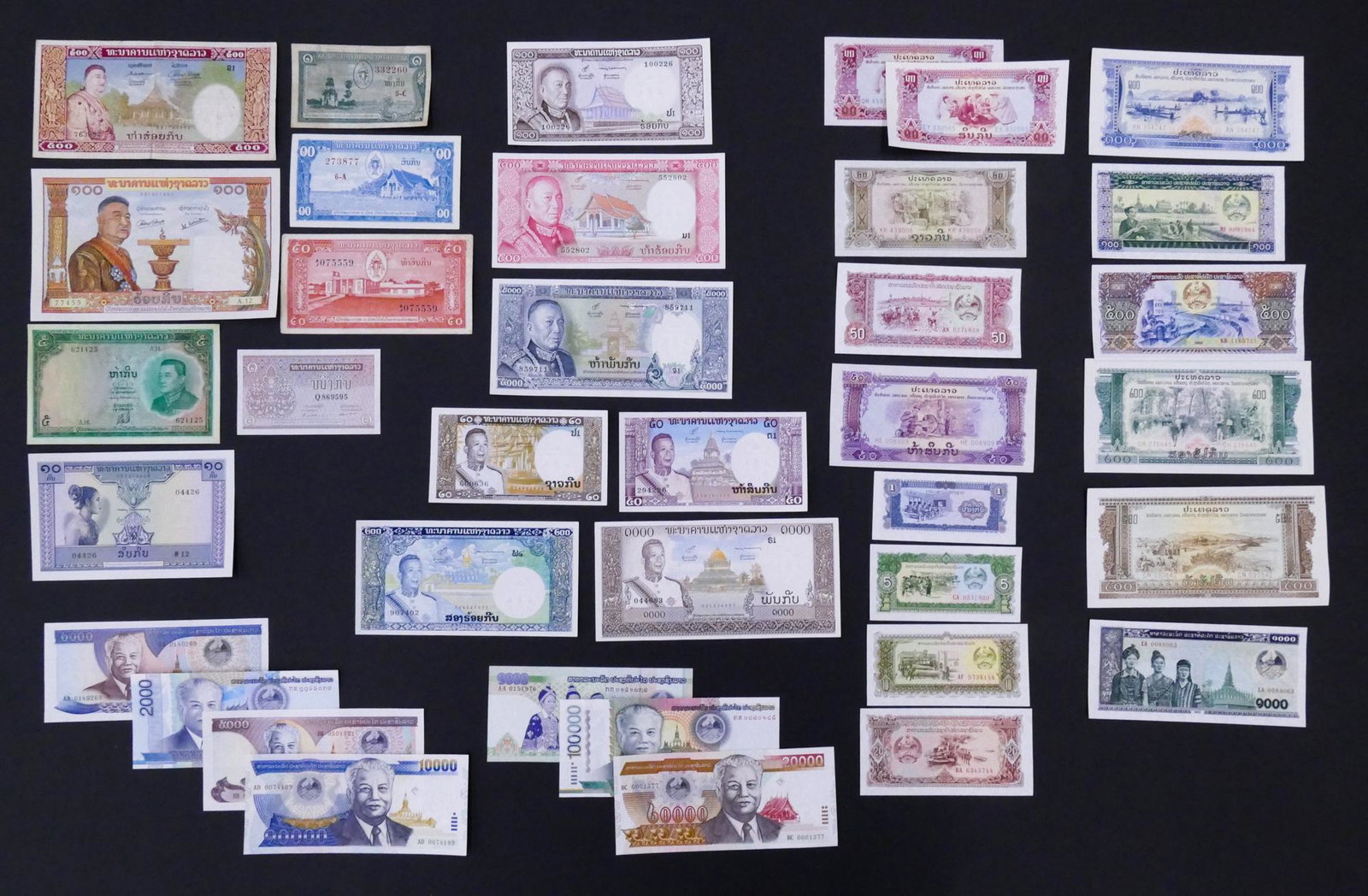 Laos. 37pc 1957-2011: Laos. 37pc 1957-2011. Includes UNC Banque Nationale du Laos 100 Kip ND (1957) Pick 6, many uncirculated