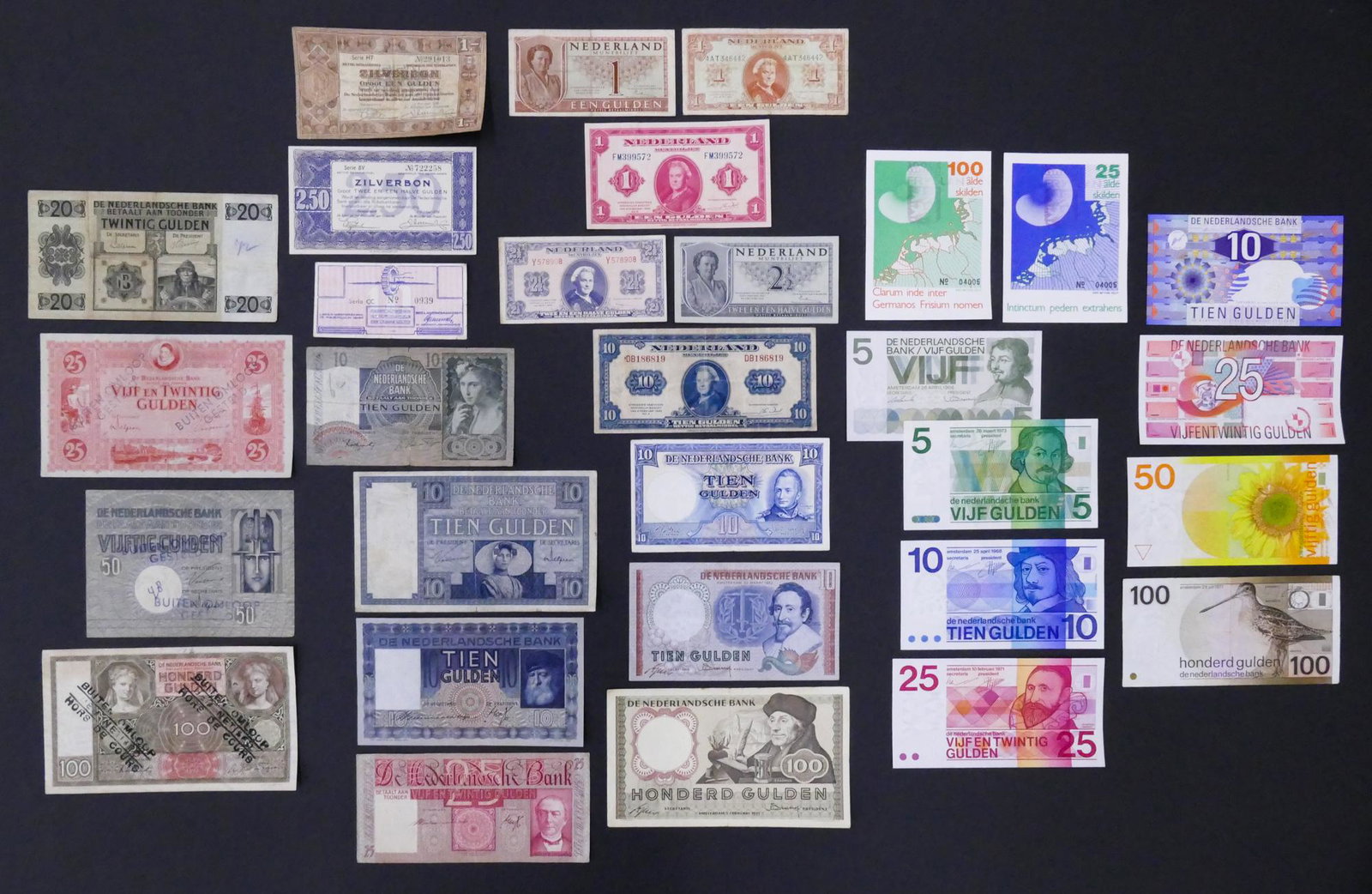 Netherlands. 30pc 1926-1989: Netherlands. 30pc 1926-1989. Includes De Nederlandsche Bank 20 Gulden 3.5.1926 Pick 44, (3pc) 'Buiten Omloop Gesteld' 50 Gulden 9.10.1929 Pick 47, 100 Gulden 19.1.1942, 25 Gulden 13.2.1930, and (1pc) 