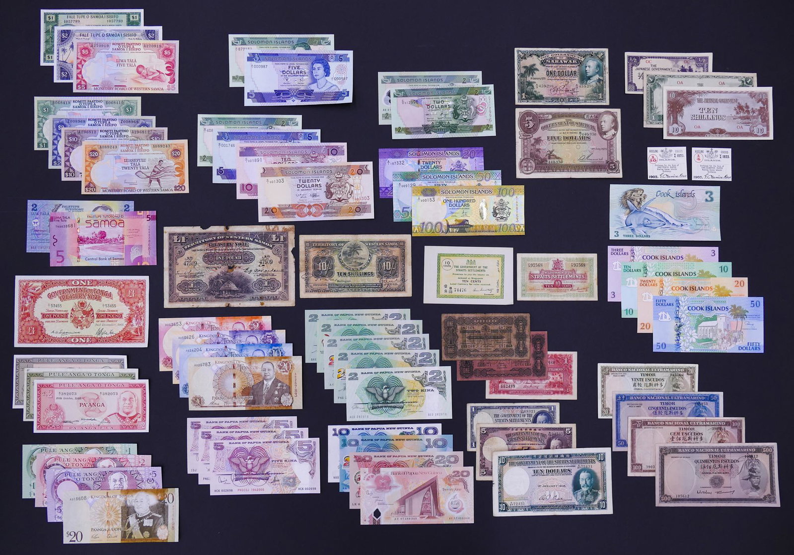 Oceania. 70pc 1902-2015: Oceania. 70pc 1902-2015. Includes 12pc Papua New Guinea (1975-2015), 12pc Tonga (1966-2015), 2pc 1902 Keeling Cocos Islands, 2pc Sarawak (1929-35), 8pc Straits Settlements (1906-35), 4pc Timor (1963-6