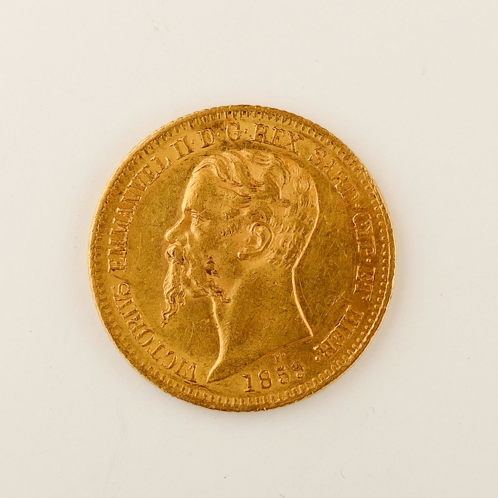 Sardinia. Vittorio Emanuele II Gold 20 Lire 1859-P: Sardinia. Vittorio Emanuele II Gold 20 Lire 1859-P. 6.47g, 22mm wide, 2mm thick. not graded.