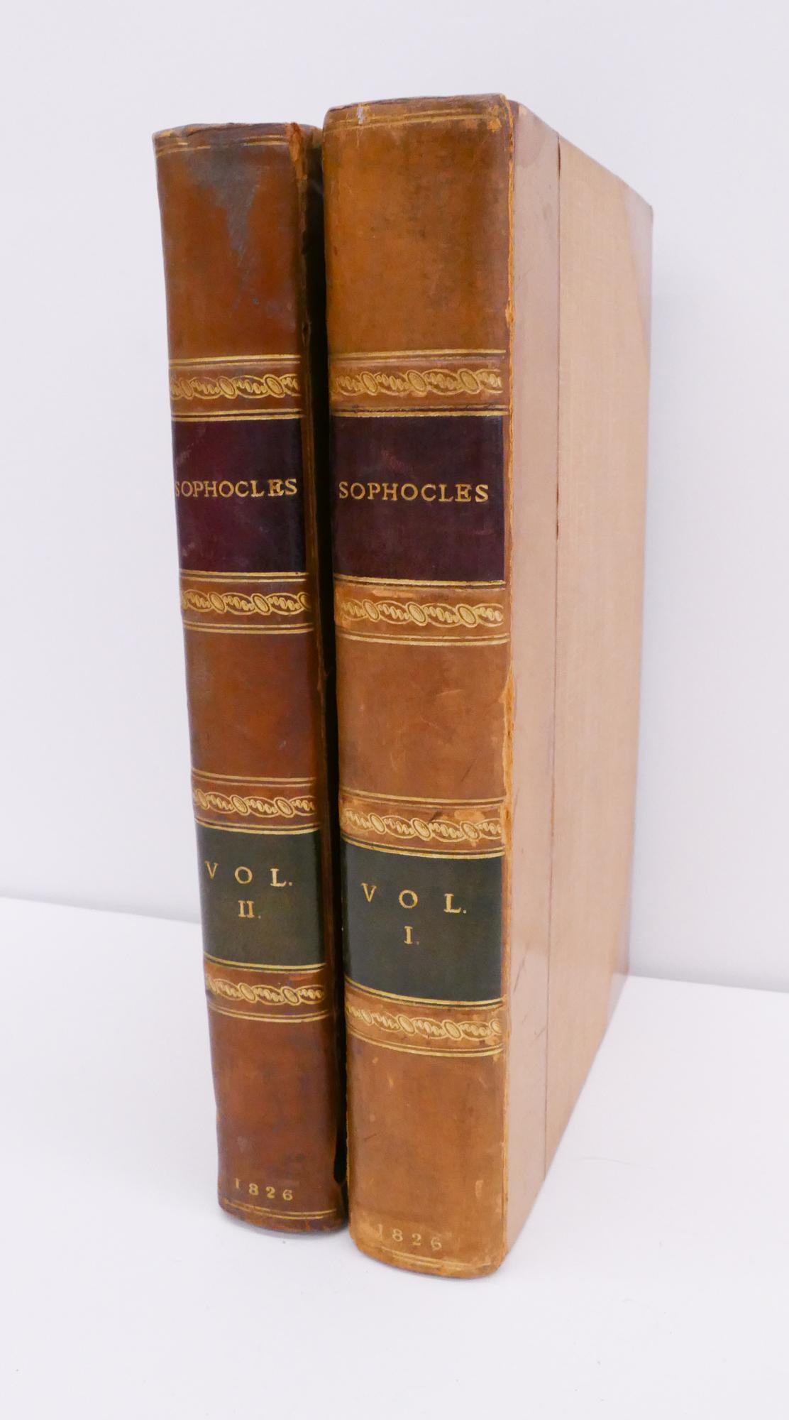 2 Volumes Sophoclis. G.B. Whittaker London, 1826: 2 Volumes Sophoclis. G.B. Whittaker London, 1826. Partially leather bound with gilt decoration, marbled end pages. Volume I 511pp, Volume II 216pp. Some staining around edges and wear to cover.