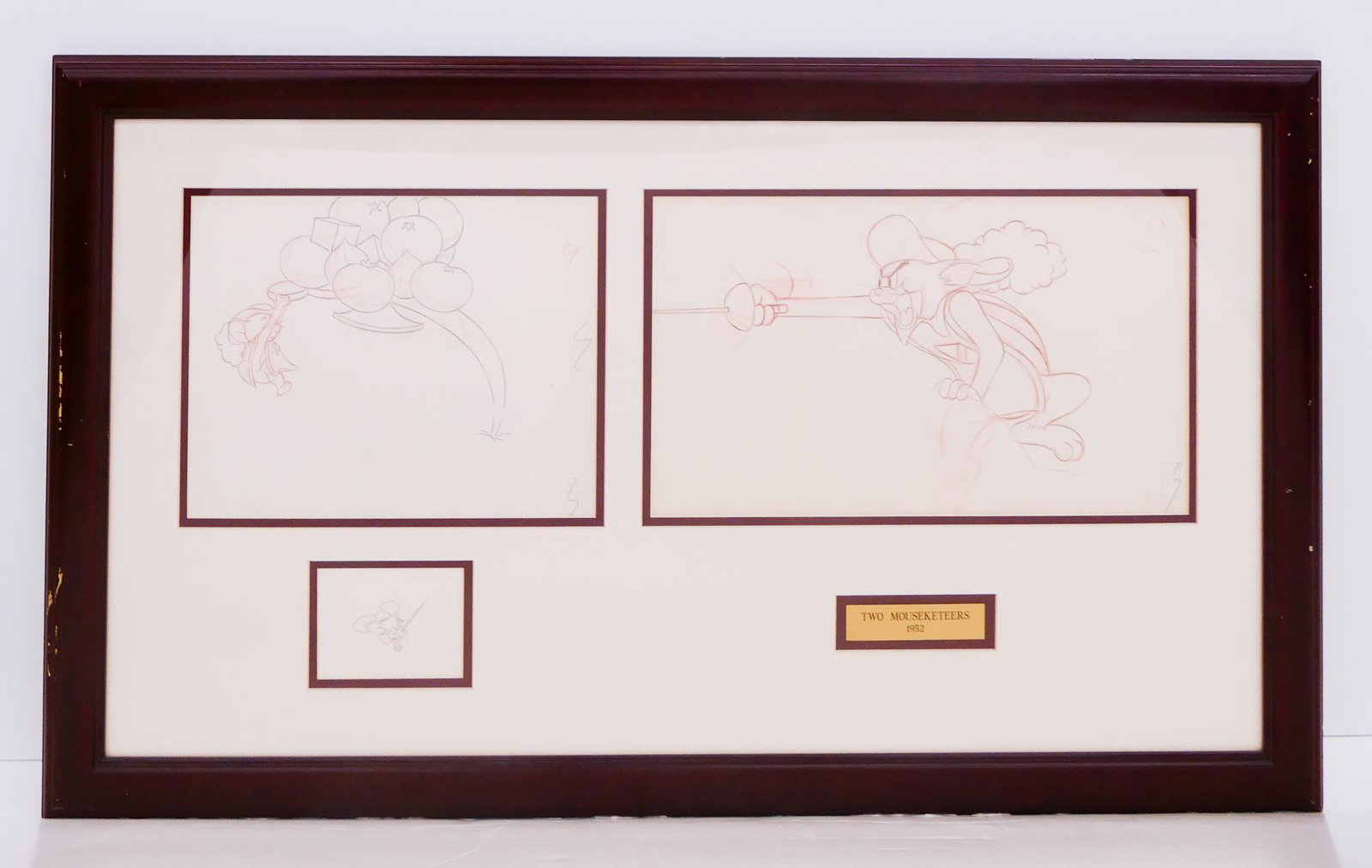 MGM Studio 'Tom, Jerry & Nibbles' Triptych Drawing: MGM Studio 'Tom, Jerry & Nibbles' Triptych Original Production Drawings, 1952. From 'Two Mouseketeers'. Framed measurements are 21.75x36.5'' with 3 mat windows of various sizes. Great American Ink COA