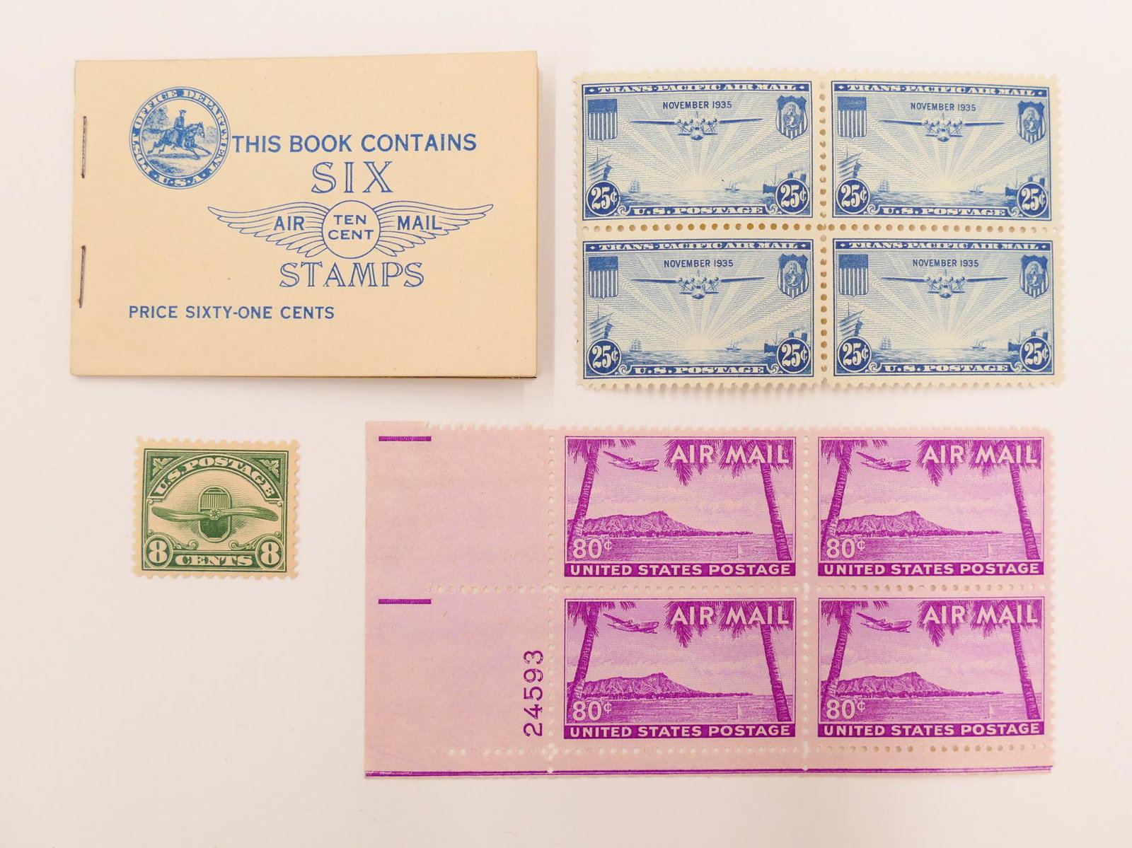 4pc US Air Mail Stamp Collection 1923-1952: 4pc US Air Mail Stamp Collection 1923-1952. Includes #C10a 1927 10c Lindbergh Stamp Book (excellent condition with 2 panes of 3), #C4 - 1923 8c Radiator & Propeller (1 unused), #C20 1935 25M China Cli