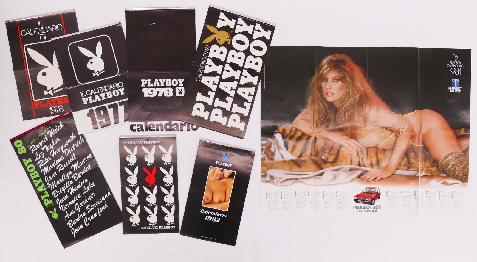 9pc Playboy Italy Wall Calendars 1976-84: 9pc Playboy Italy Wall Calendars and Calendar Poster 1976-84. Includes 7pc 'Playboy Calendario' for 1976, 77,78, 79, 80, 81, 82, and 1pc 1984 folded Calendar Poster (26.5x33''). Also included is a '10