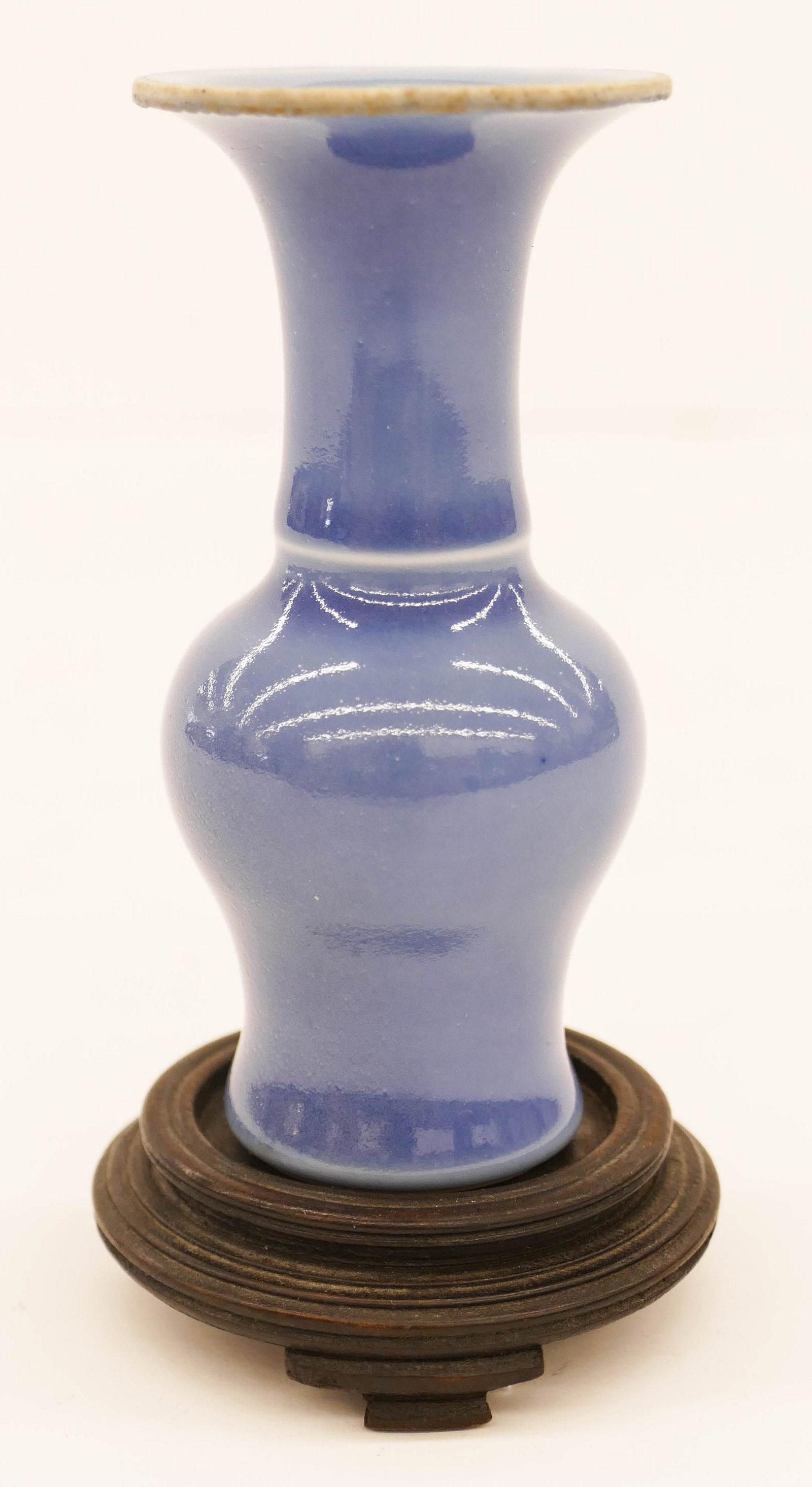 Chinese Sky Blue Yen Yen Vase: Chinese Sky Blue Yen Yen Miniature Vase 4.25''x2''. Pale blue monochrome glaze. Comes with rosewood stand .75''x2.5''. Six character blue underglaze Yongzheng commemorative mark. Glaze roughness aroun