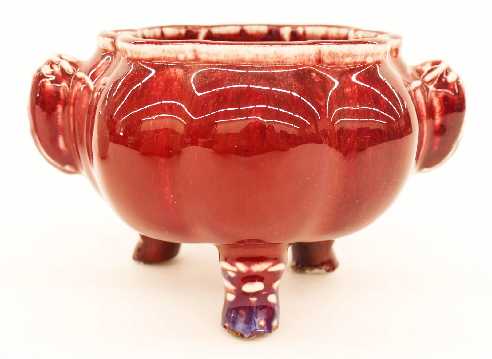 Chinese Qing Flambe Cicada Tripod Censer: Chinese Qing Flambe Cicada Tripod Censer 5''x7.5''. A deep oxblood glazed lobed censer with figural cicada handles and flambe splashes. Unmarked. Some kiln chipping to bottom of feet, original to its 