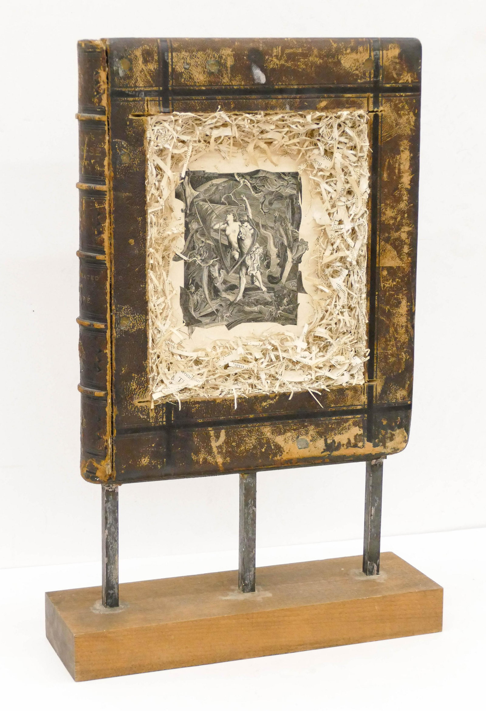 Jonah DeCaspri ''Milton Paradise Lost'' Sculpture: Jonah DeCaspri (20/21st Cent. American) ''Milton Paradise Lost'' Sculpture Assemblage 22''x14''. An altered leatherbound book with encaustic image. Signed on side. Excellent condition.