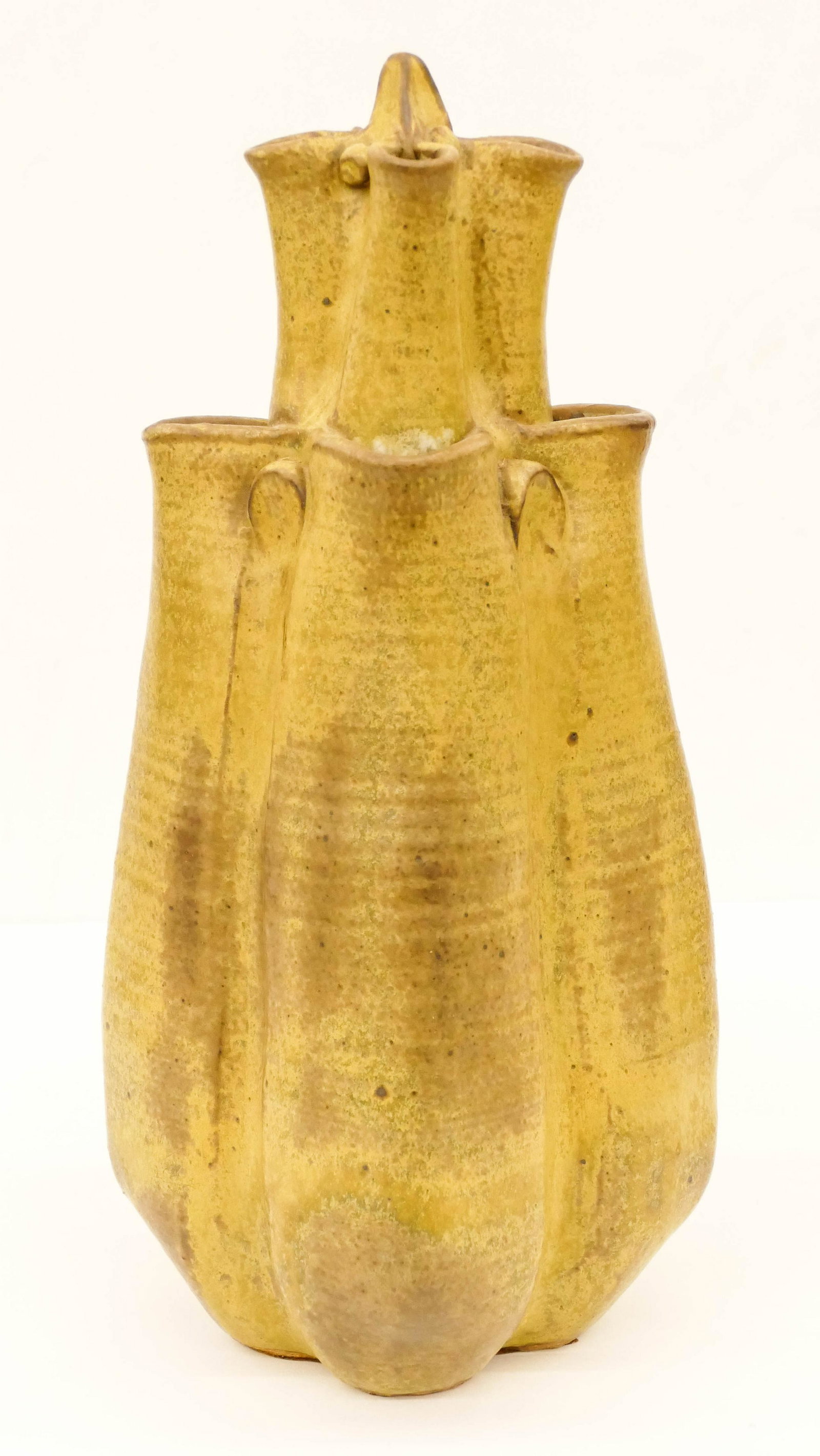 Frederick F.C. Ball ''Multi-spouted Vessel'' Stoneware: Frederick F.C. Ball ''Multi-spouted Vessel'' Stoneware 14''x7''. Wheel thrown and altered form vessel with eight spouts. Covered in a mustard yellow speckled glaze. Incised signature on bottom. Excell