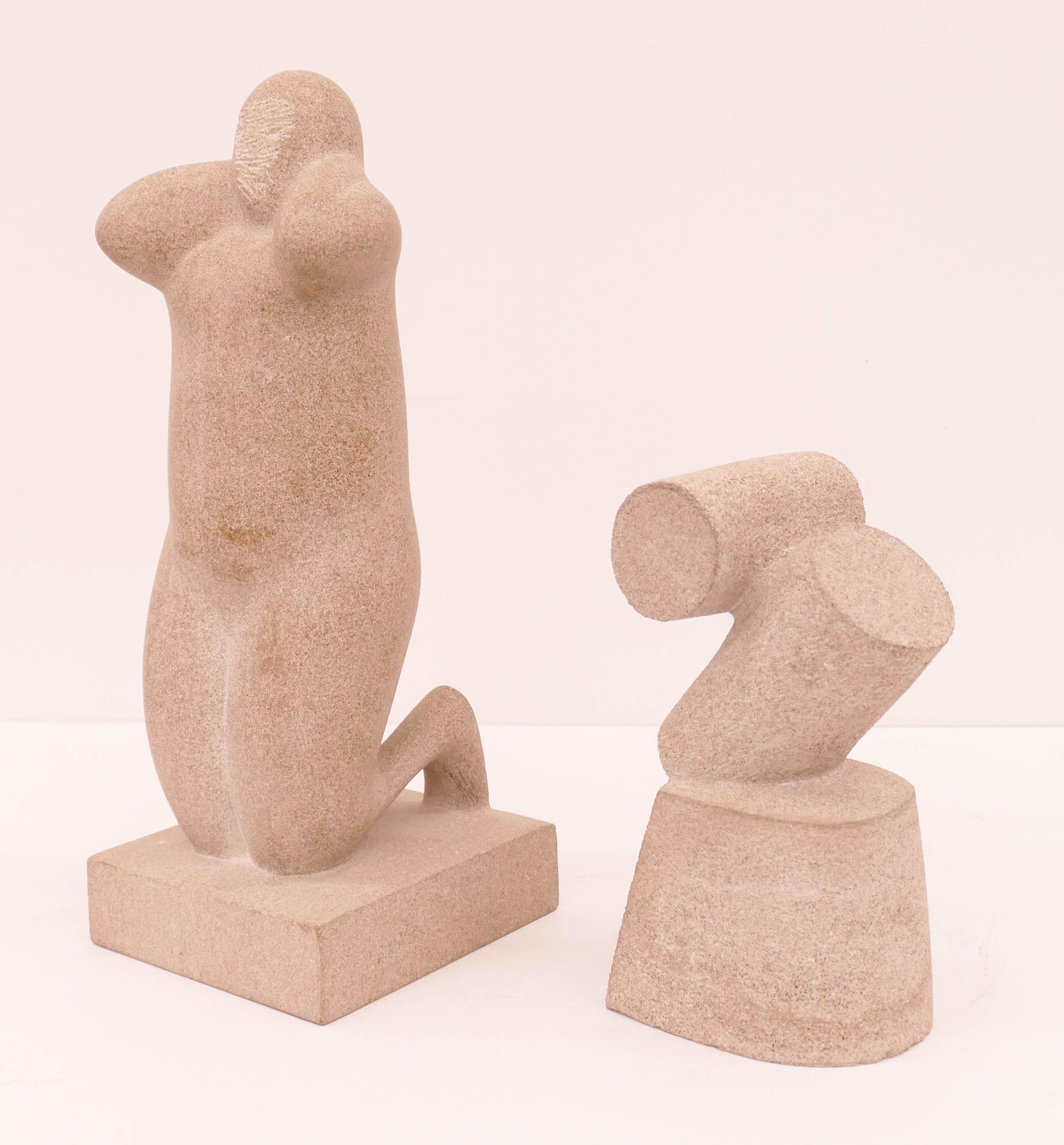 2pc Don Wilson ''Kneeling Figure and Geometric: 2pc Don Wilson (1934-2008 Oregon) ''Kneeling Figure and Geometric Sculptures'' Limestone. Includes a stylized kneeling figure 13.5''x5''x6'' and a geometric sculpture 8''x4''. Unsigned. Overall excell