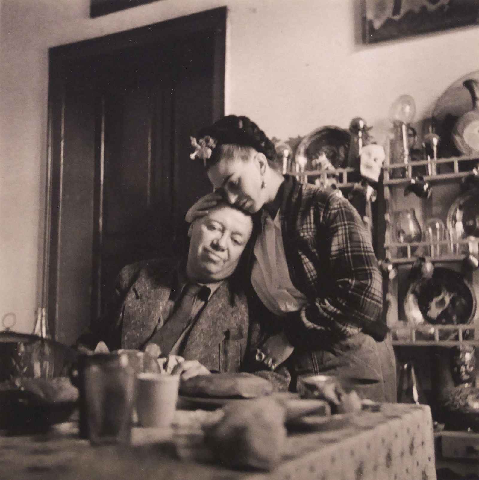 EMMY LOU PACKARD 'FRIDA KAHLO & DIEGO RIVERA': Emmy Lou Packard (1914-1998 California) ''Frida Kahlo and Diego Rivera at Lunch in their Home in Coyoacan, 1941'' Platinum/Palladium Print. Printed 1995, Edition 23/40. Image measures 5x5'' and is on