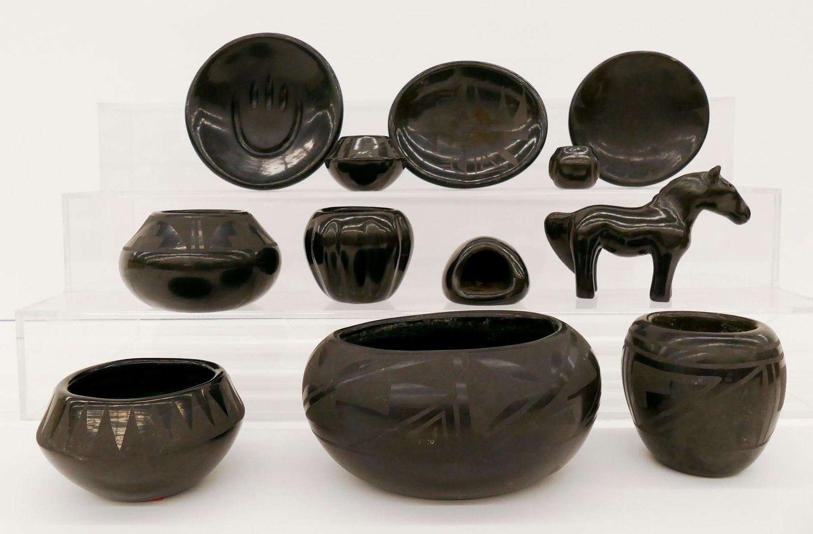 12pc Santa Clara & San Ildefonso Blackware Pottery: 12pc Santa Clara & San Ildefonso Blackware Pottery. Sizes range from 1.5'' to 6'' wide. Includes Severa Tafoya, Lupita Martinez, J.R. Padilla, Cresencia Tafoya, etc. Some have damage.