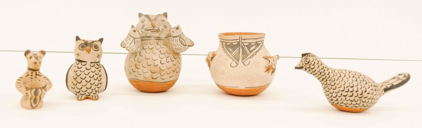 5pc Old Santa Domingo & Cochiti Figures and Jar: 5pc Old Santa Domingo & Cochiti Figures and Jar. First half 20th century. Sizes range from 3'' to 5''. Includes Teresita Romero small bird jar, Owl family figure (repaired), small owl figure, bear fig