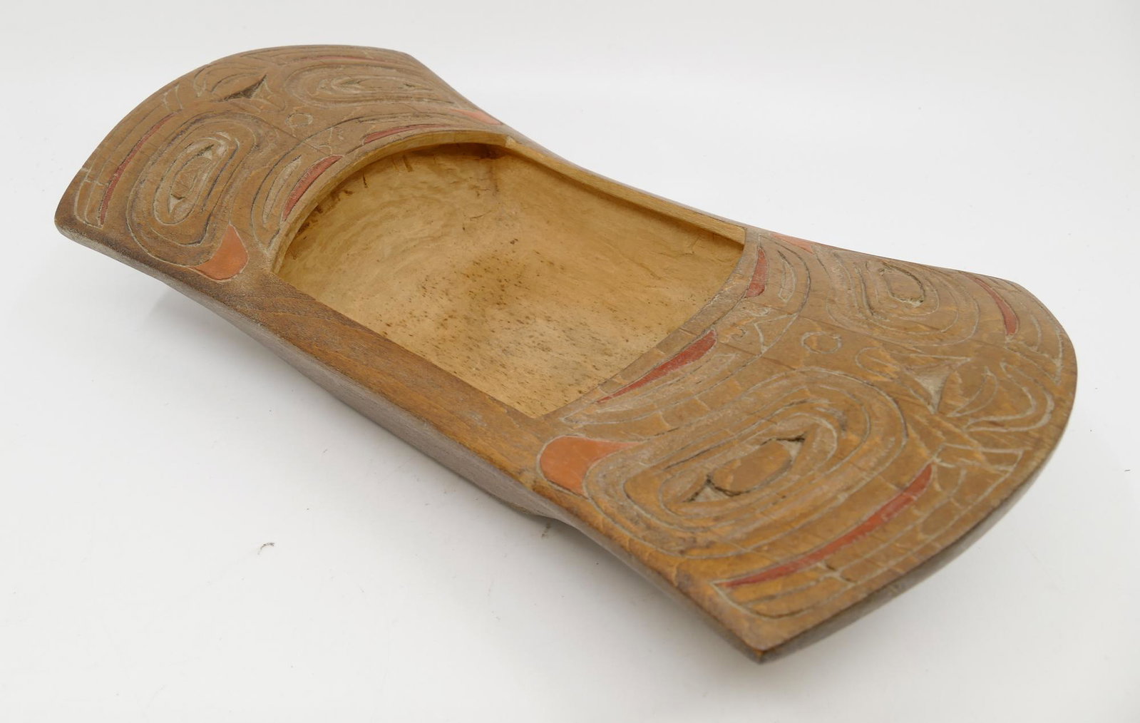 Northwest Coast Cedar Food Dish: Northwest Coast Cedar Food Dish. Measures 2x11.5x6''. Tlingit or Haida style relief carved and painted U-form motif dish. Signed A.D. 1973. Overall excellent condition.