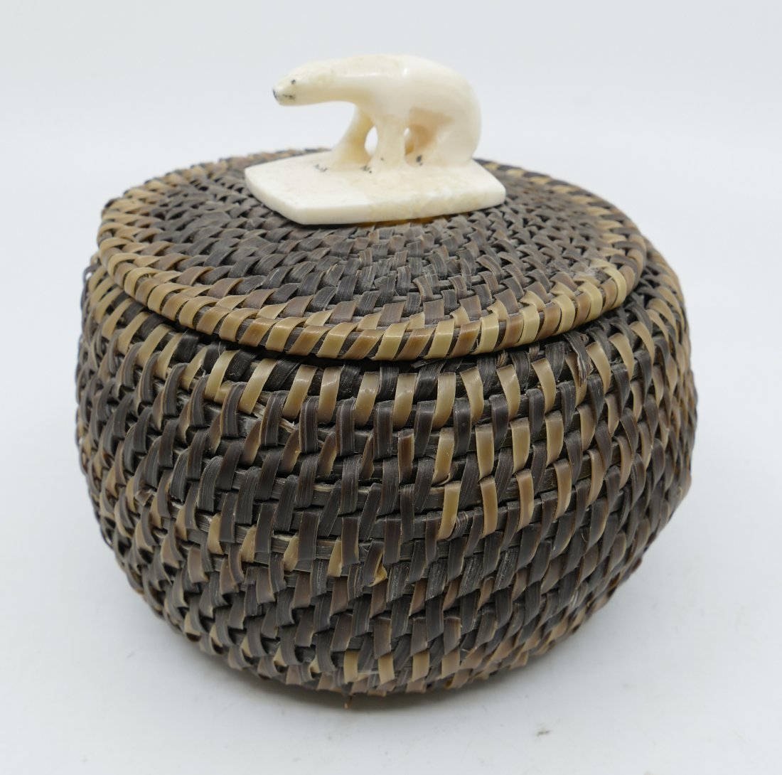 Herbert Koonuk Inuit Polar Bear Baleen Basket: Herbert Koonuk (1911-1994 Inuit) Polar Bear Baleen Basket. Mid 20th century. Measures 4'' tall with 4.5'' diameter. Initialed on interior. A few small breaks to top rim.
