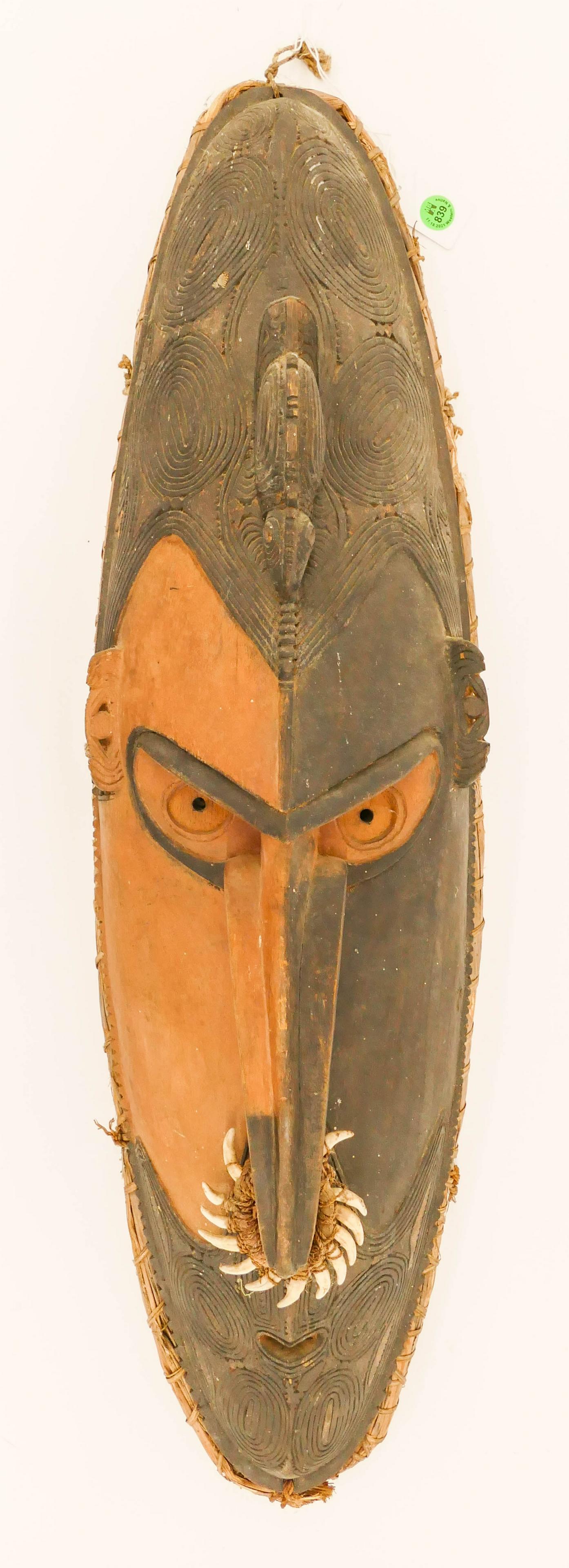 Old Sepik River Murik Lakes New Guinea Mask: Old Sepik River Murik Lakes New Guinea Wood Mask 29x8.5''. Two color carved and painted wood mask with woven tooth ring around nose. Scattered edge and surface wear. Purchased circa 1950-1960. Collect