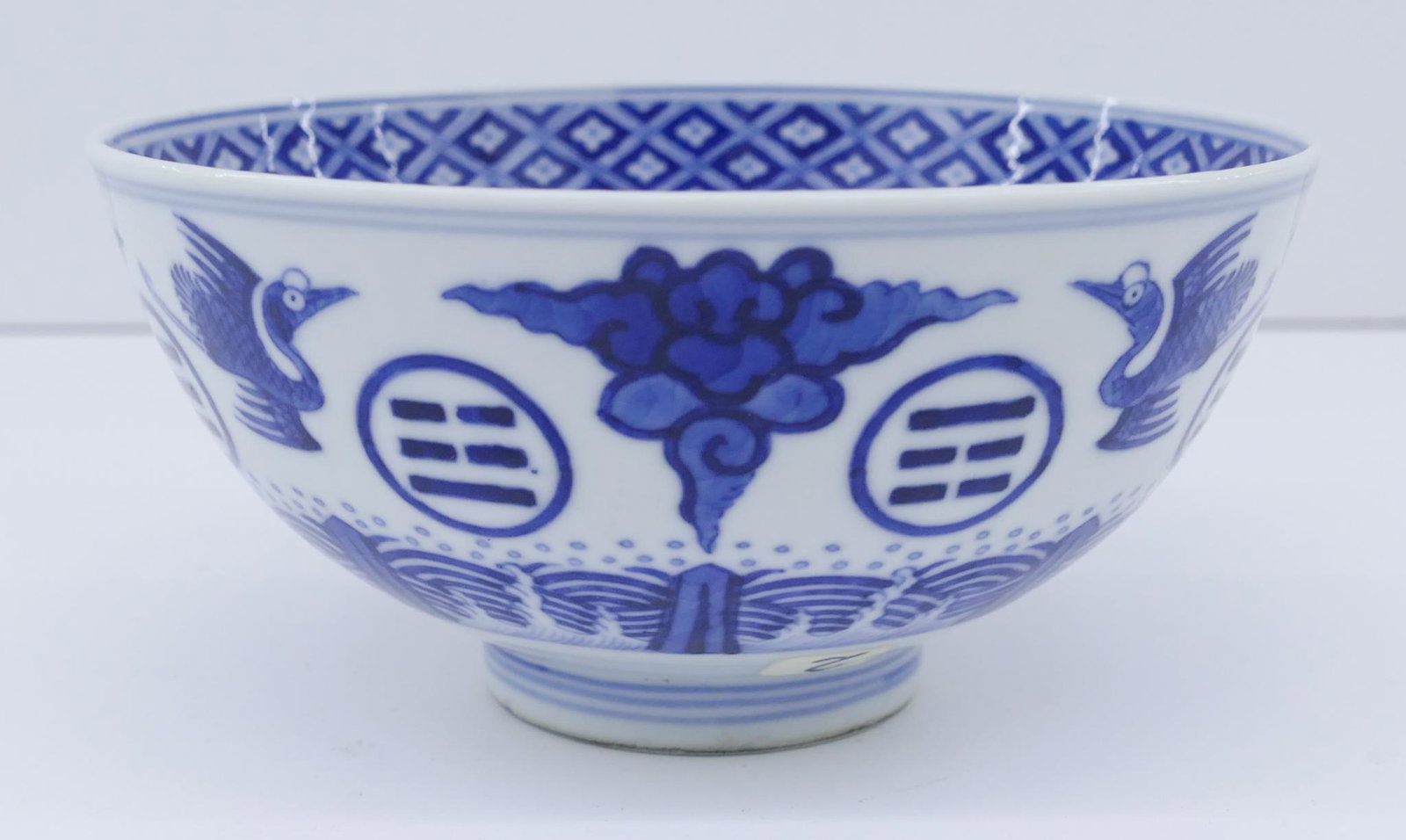 Chinese Tongzhi Trigram Blue and White Bowl: Chinese Tongzhi Trigram Blue and White Bowl 2.75''x5.5''. Fine blue underglaze decorated bowl with the buddhist trigrams and cranes. Six character blue underglaze Tongzhi mark and of the period. It ha