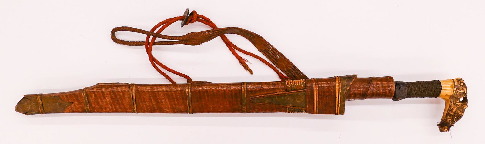 Philippines Dayak Mandao 19th Cent. Sword: Philippines Dayak Mandao 19th Cent. Sword 26.5''. Decorated carved horn or bone handle. Original wood scabbard. Missing small side dagger. Some surface wear from age. 19th or early 20th century, Phili